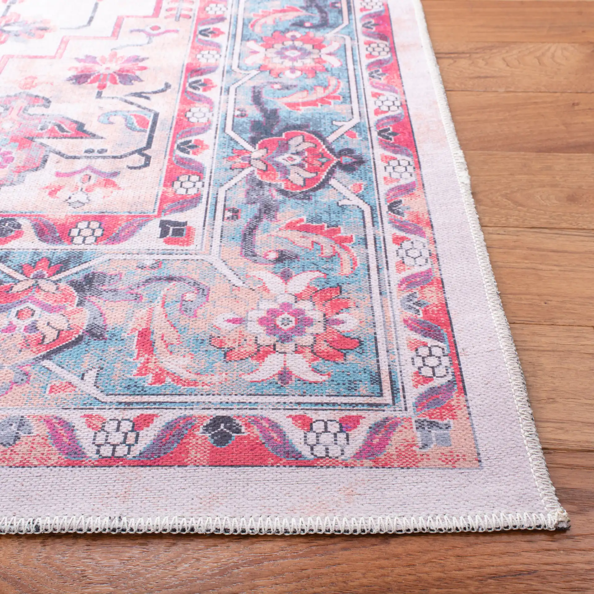 Serapi Round Medallion Washable Rug in Ivory / Light Blue in a styled room