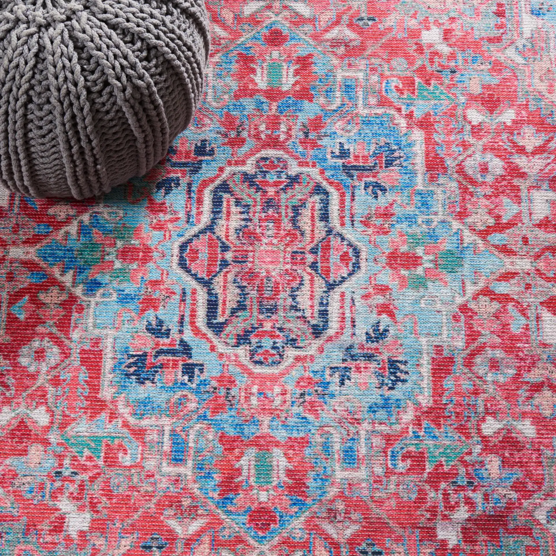 Serapi Central Medallion Washable Rug in Light Blue / Red in a styled room