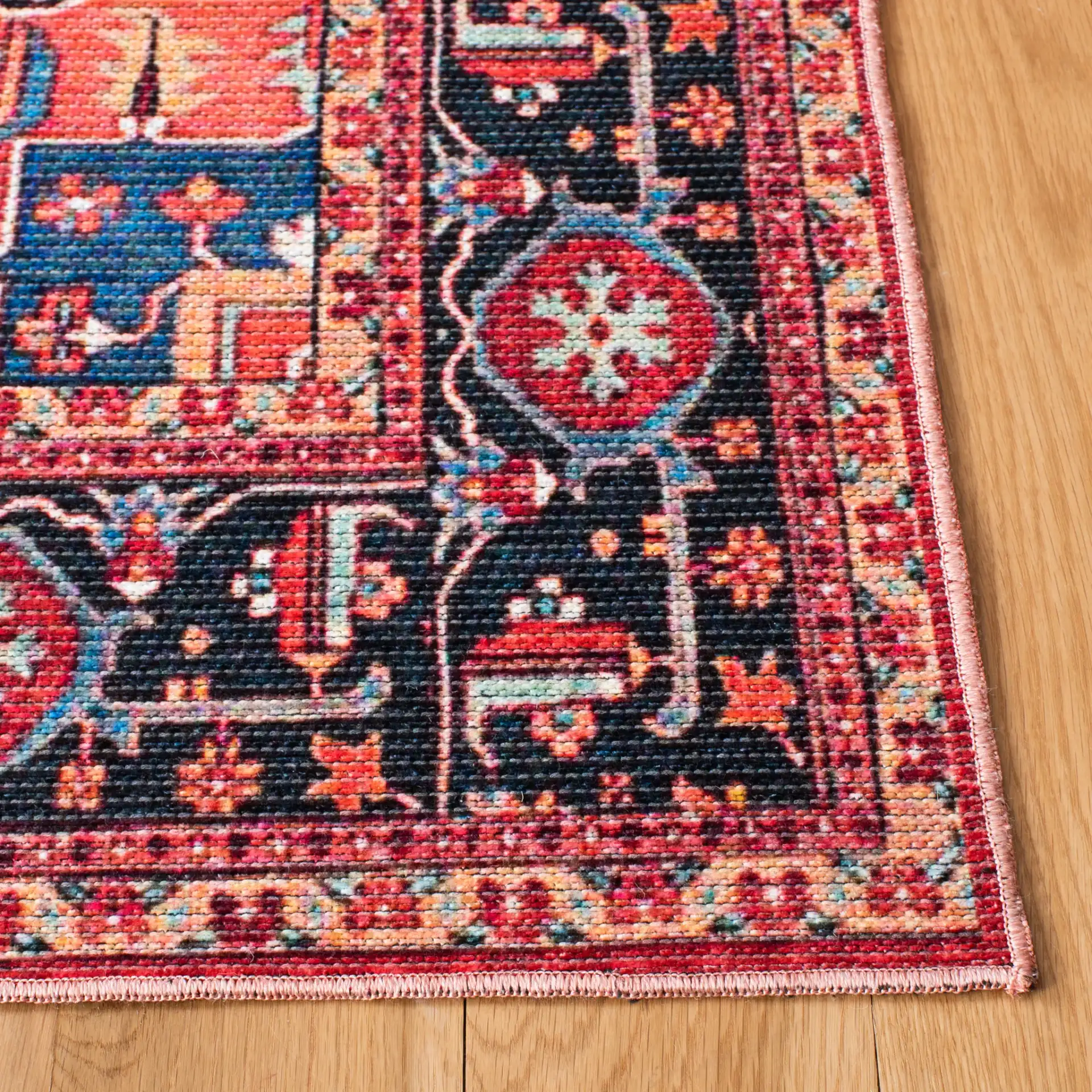 Serapi Octagon Medallion Washable Rug in Red / Blue in a styled room