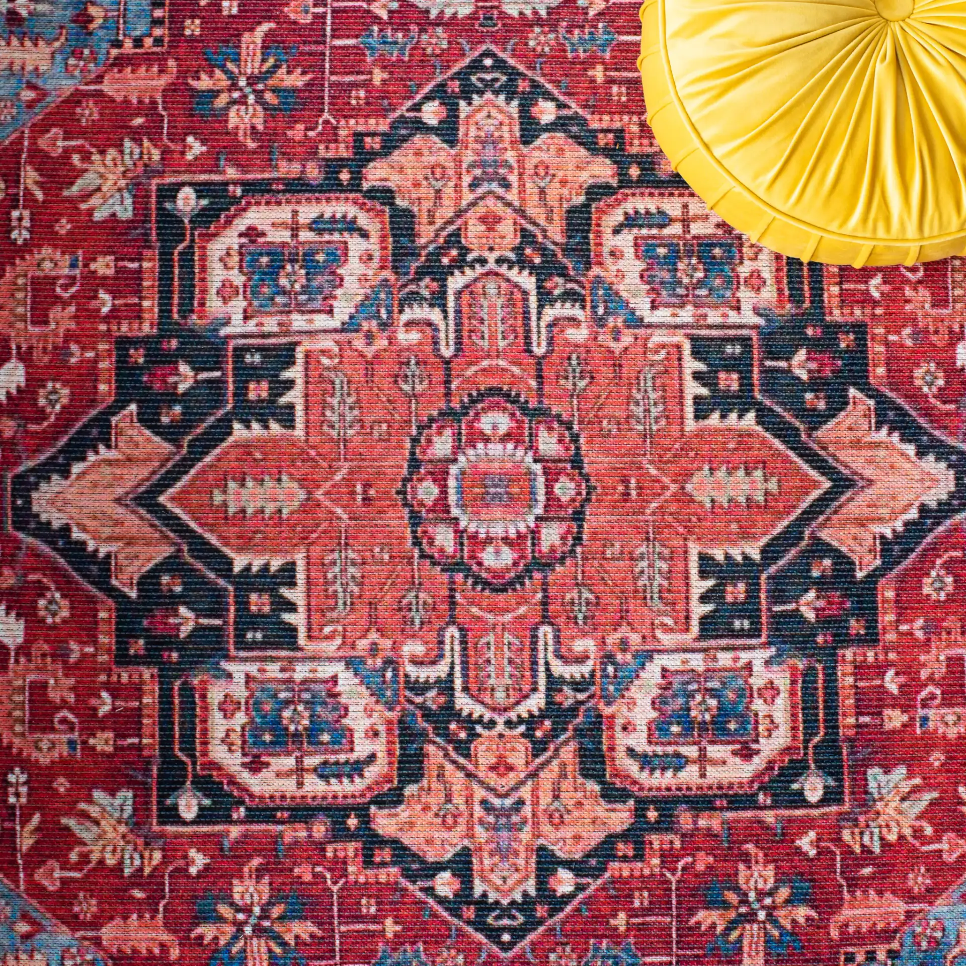 Serapi Octagon Medallion Washable Rug in Red / Blue in a styled room