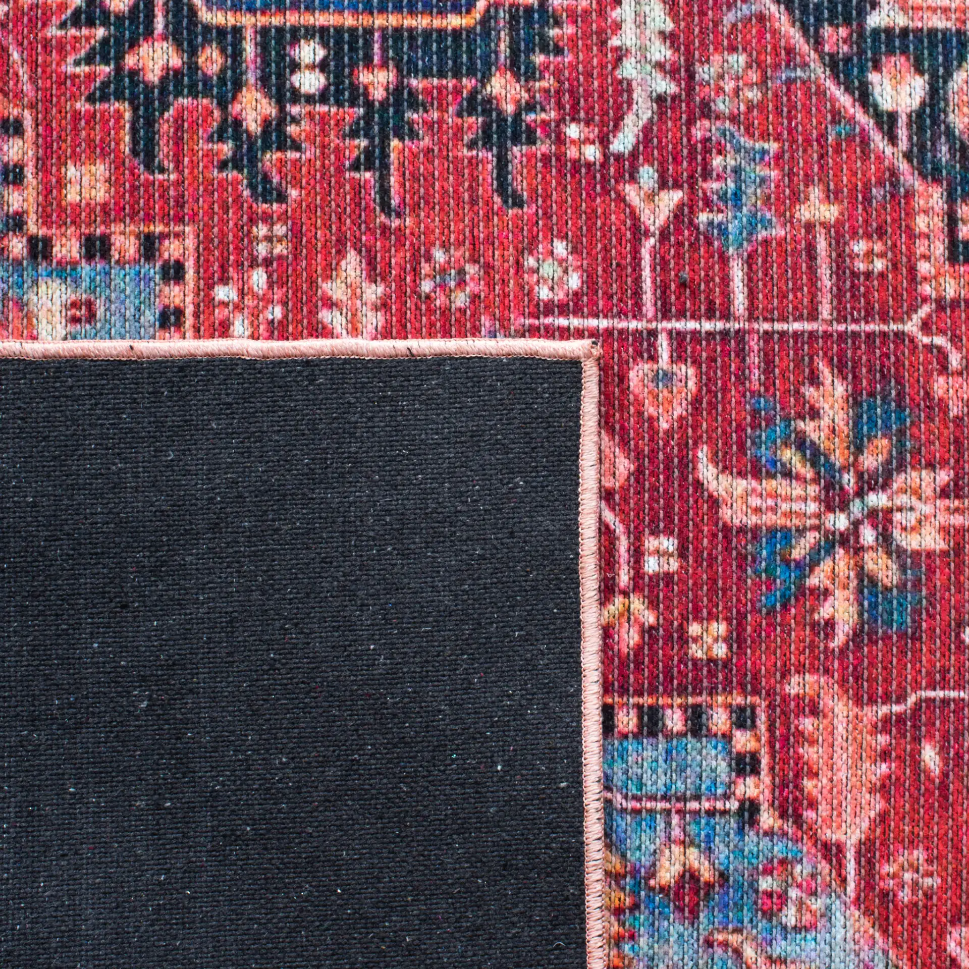Serapi Octagon Medallion Washable Rug in Red / Blue in a styled room