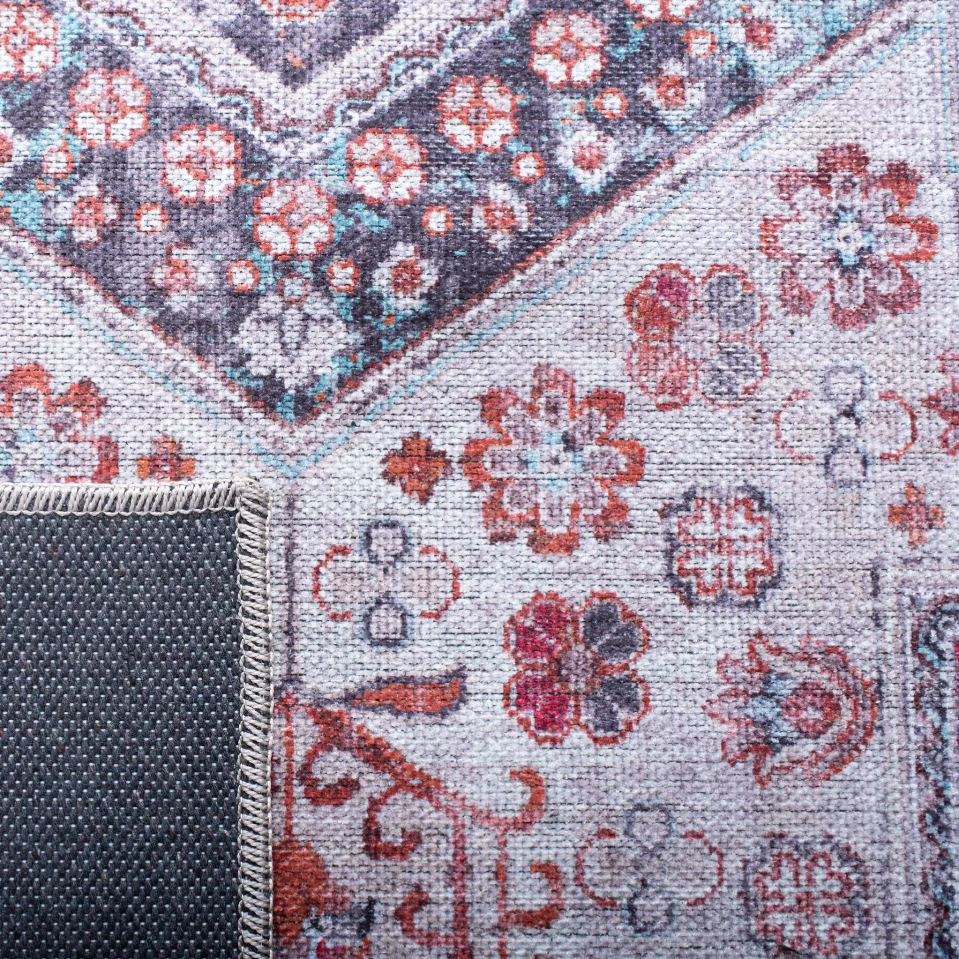 Serapi Nested Medallion Washable Rug in Rust / Ivory in a styled room