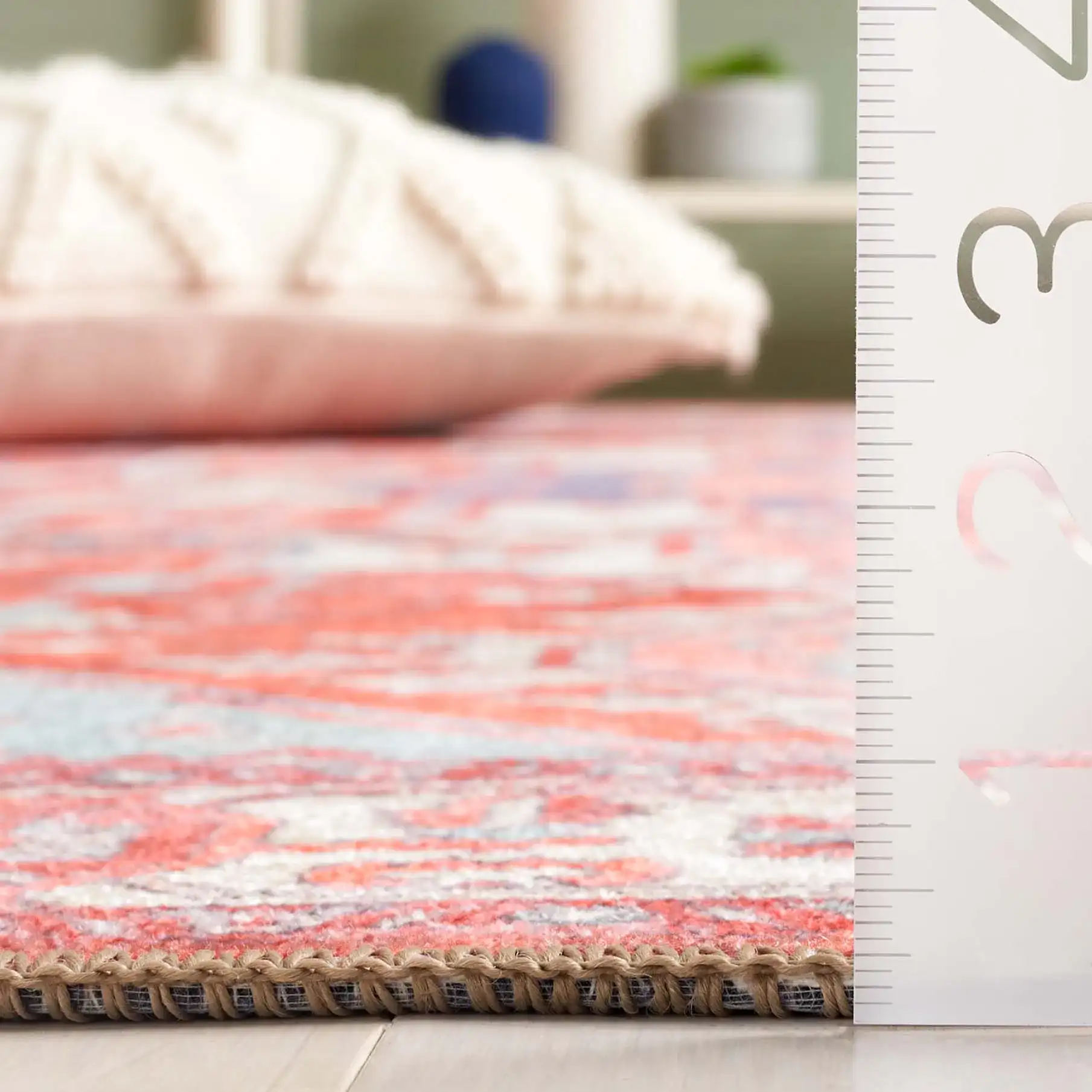 Serapi Geometric Medallion Washable Rug in Rust / Blue in a styled room