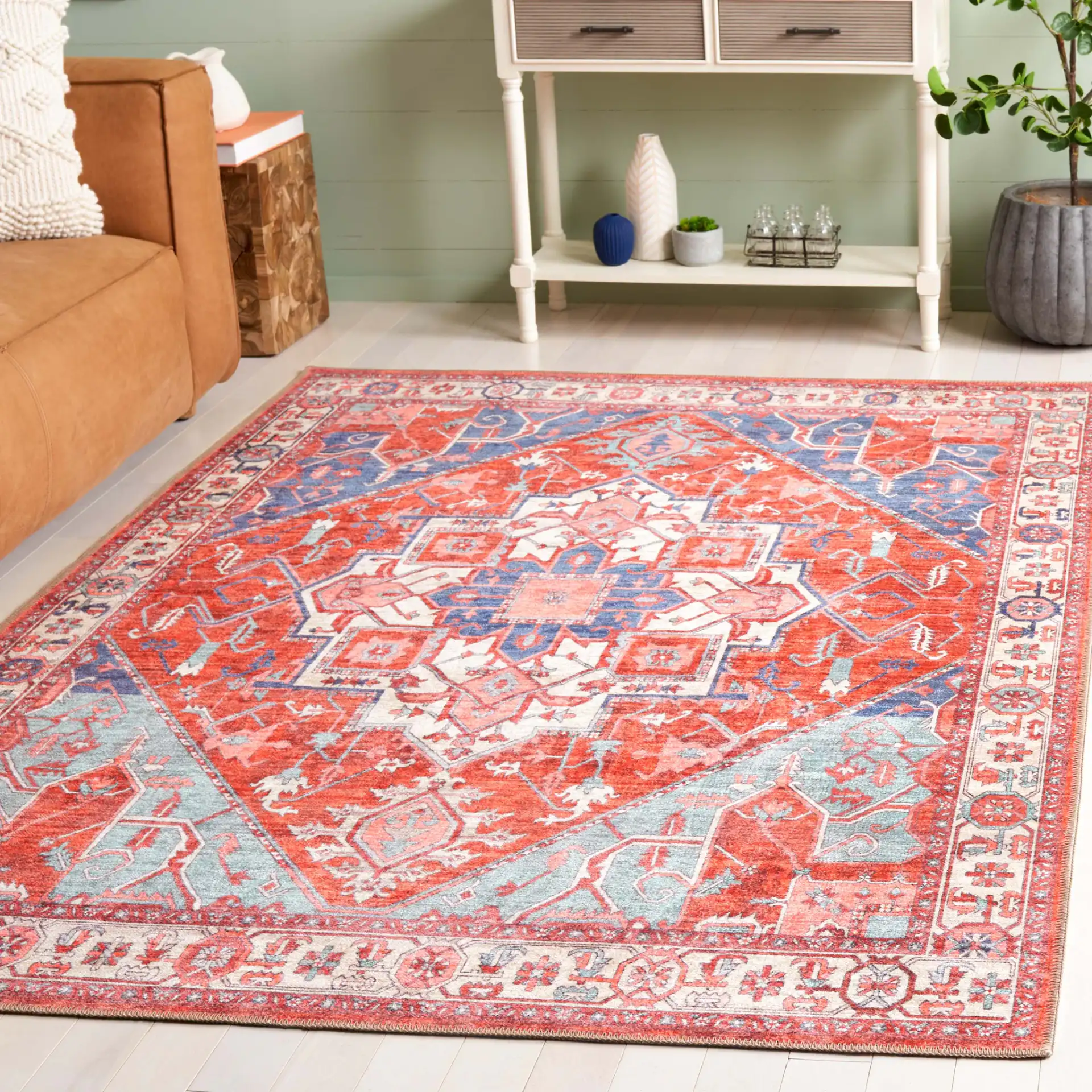 Serapi Geometric Medallion Washable Rug in Rust / Blue in a styled room