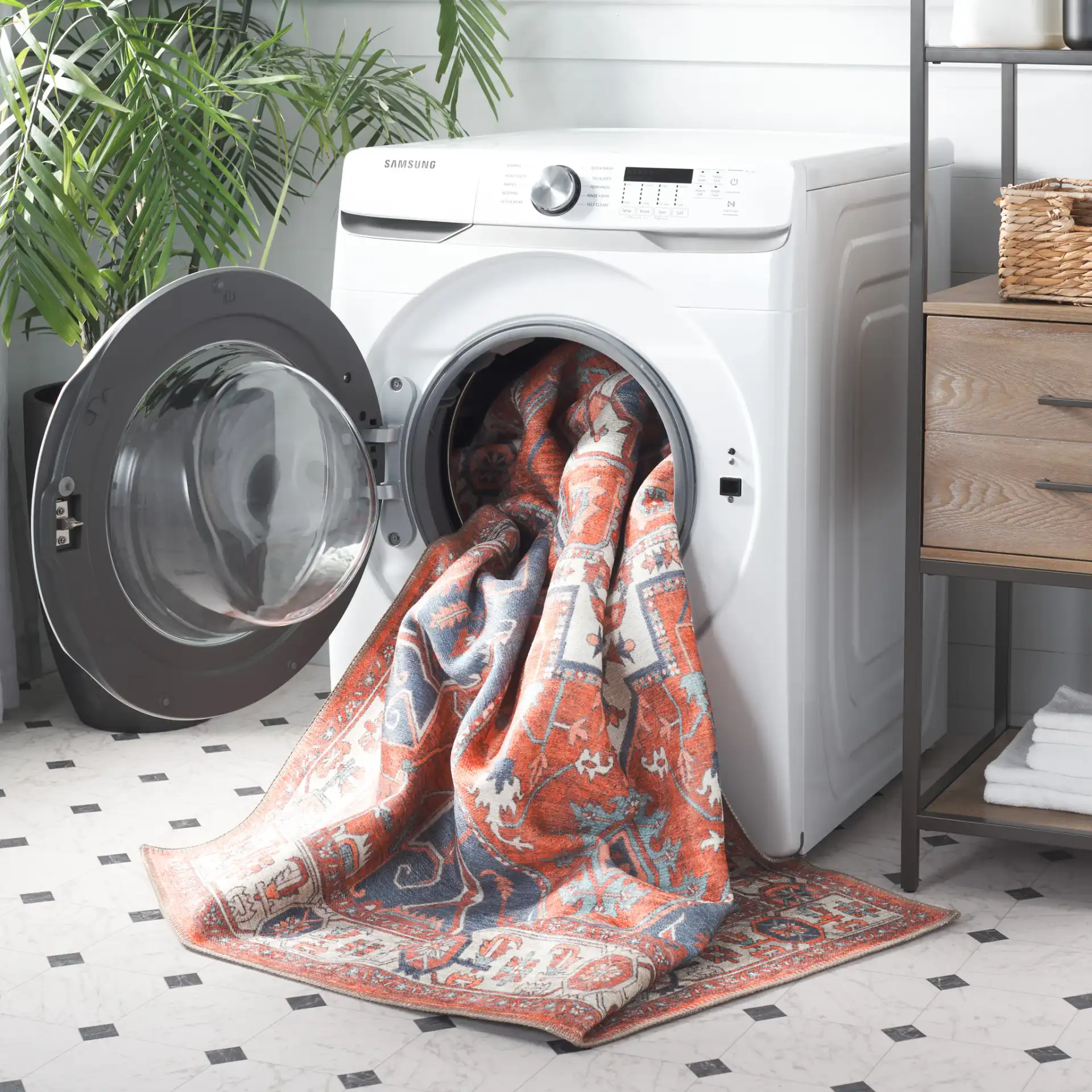 Serapi Geometric Medallion Washable Rug in Rust / Blue in a styled room