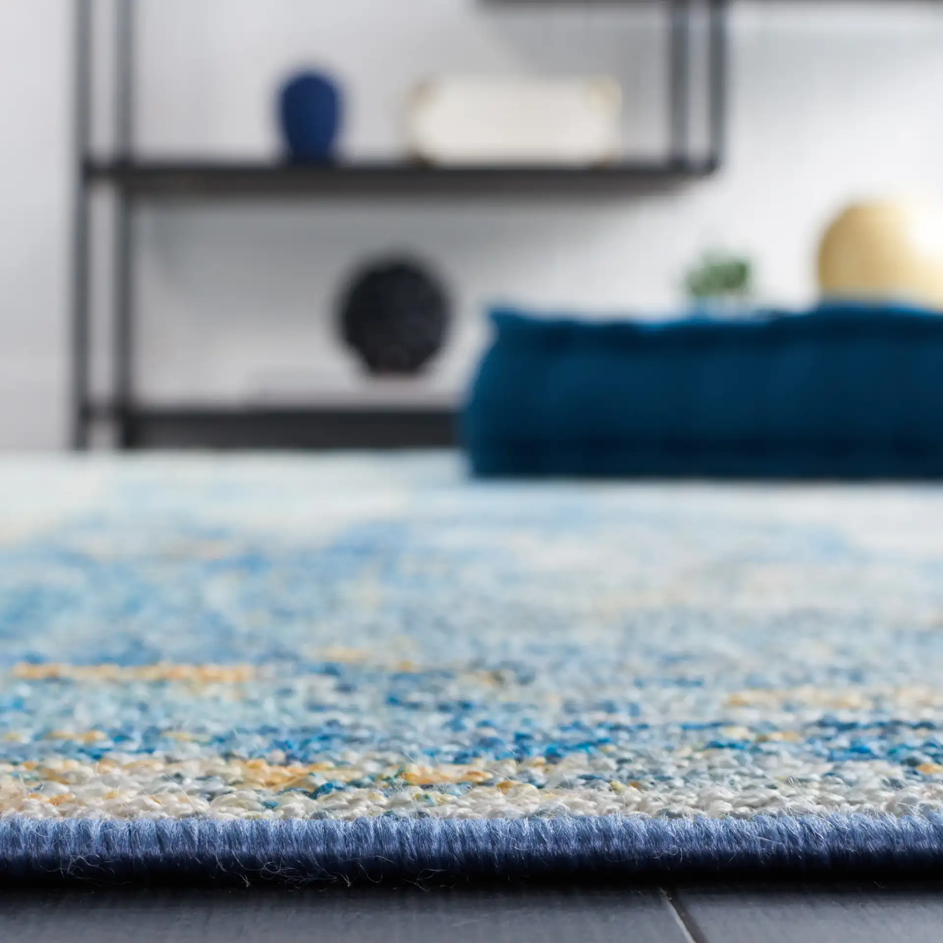 Sequoia Abstract Washable Rug in Ivory Blue / Gold in a styled room