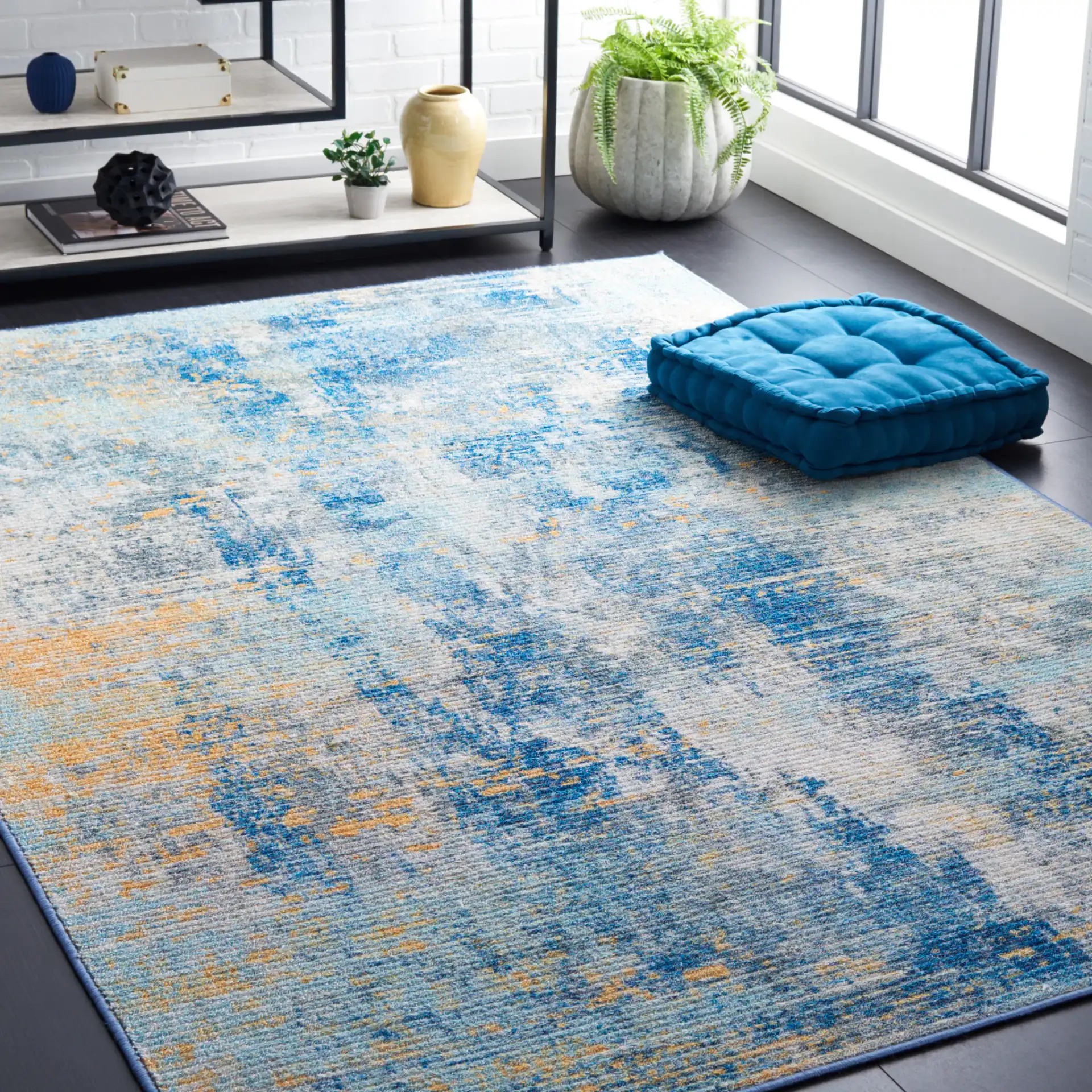 Sequoia Abstract Washable Rug in Ivory Blue / Gold in a styled room