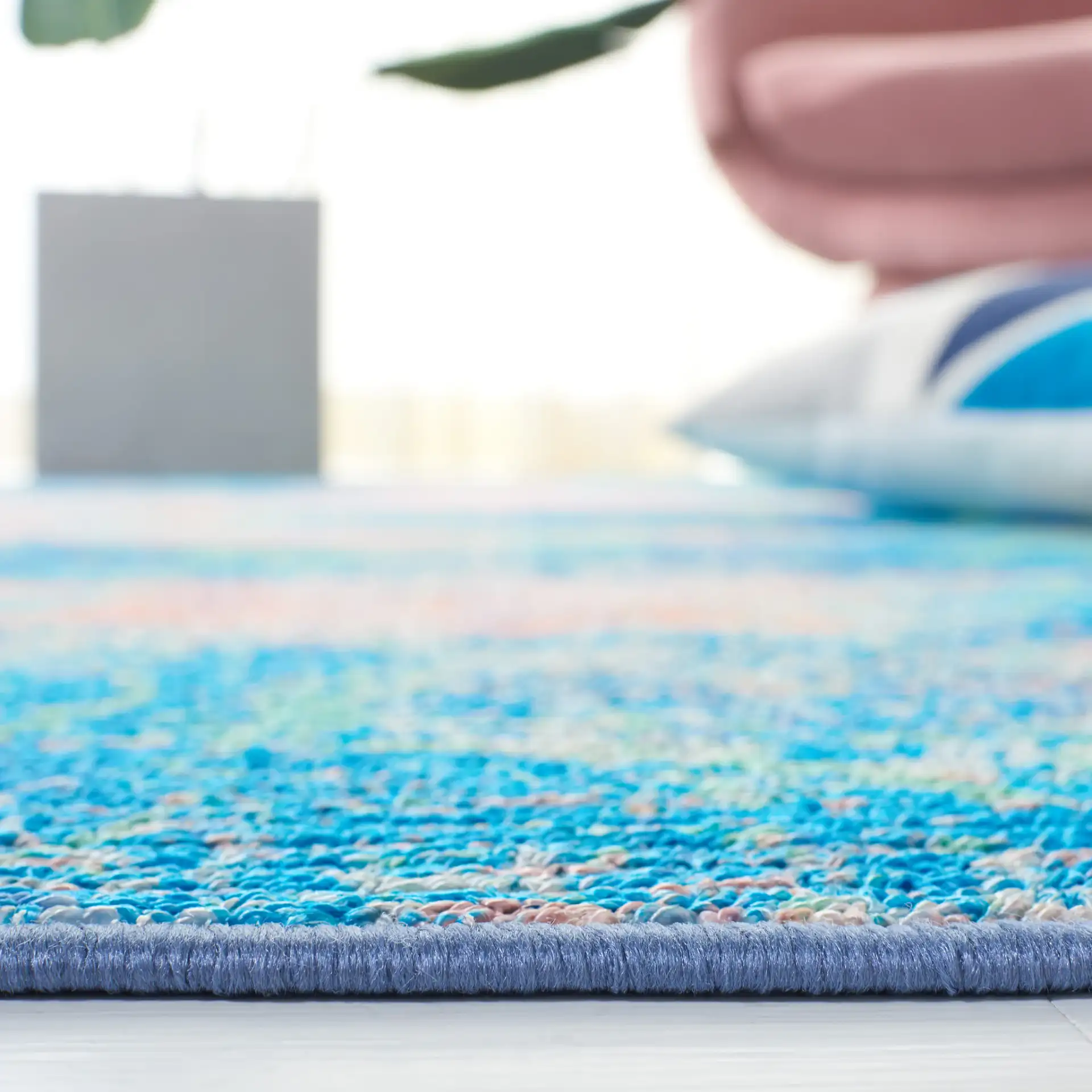 Sequoia Cloud Abstract Washable Rug in Blue / Orange in a styled room