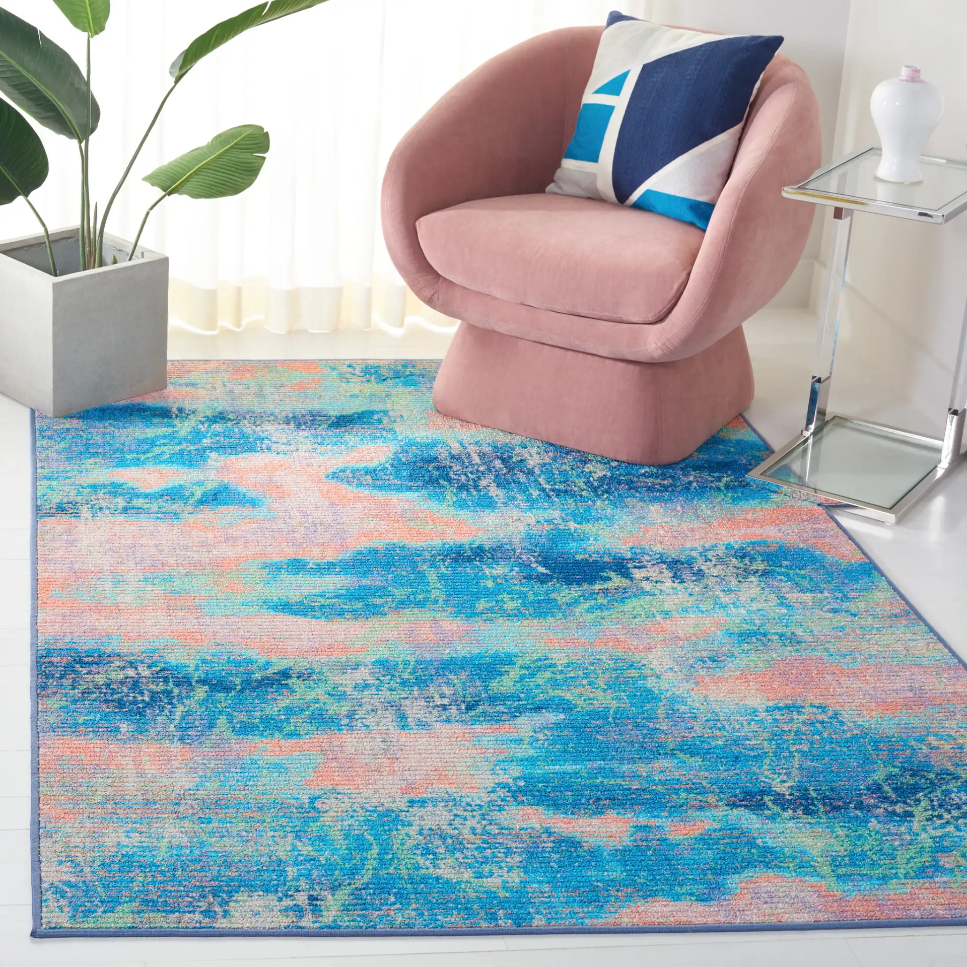 Sequoia Cloud Abstract Washable Rug in Blue / Orange in a styled room