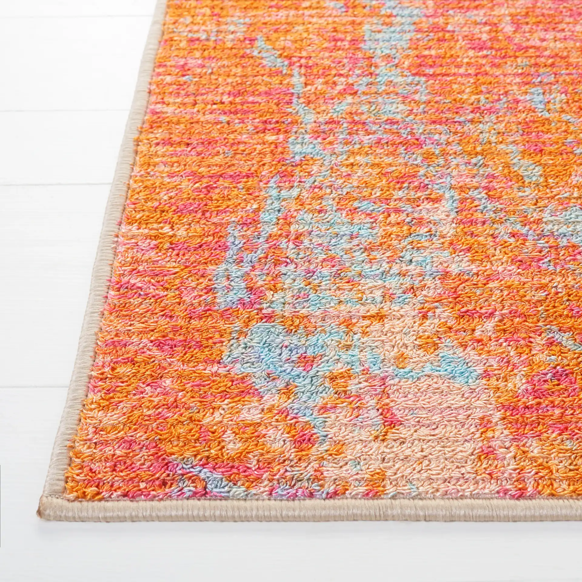 Sequoia Marble Abstract Washable Rug in Orange / Light Blue in a styled room