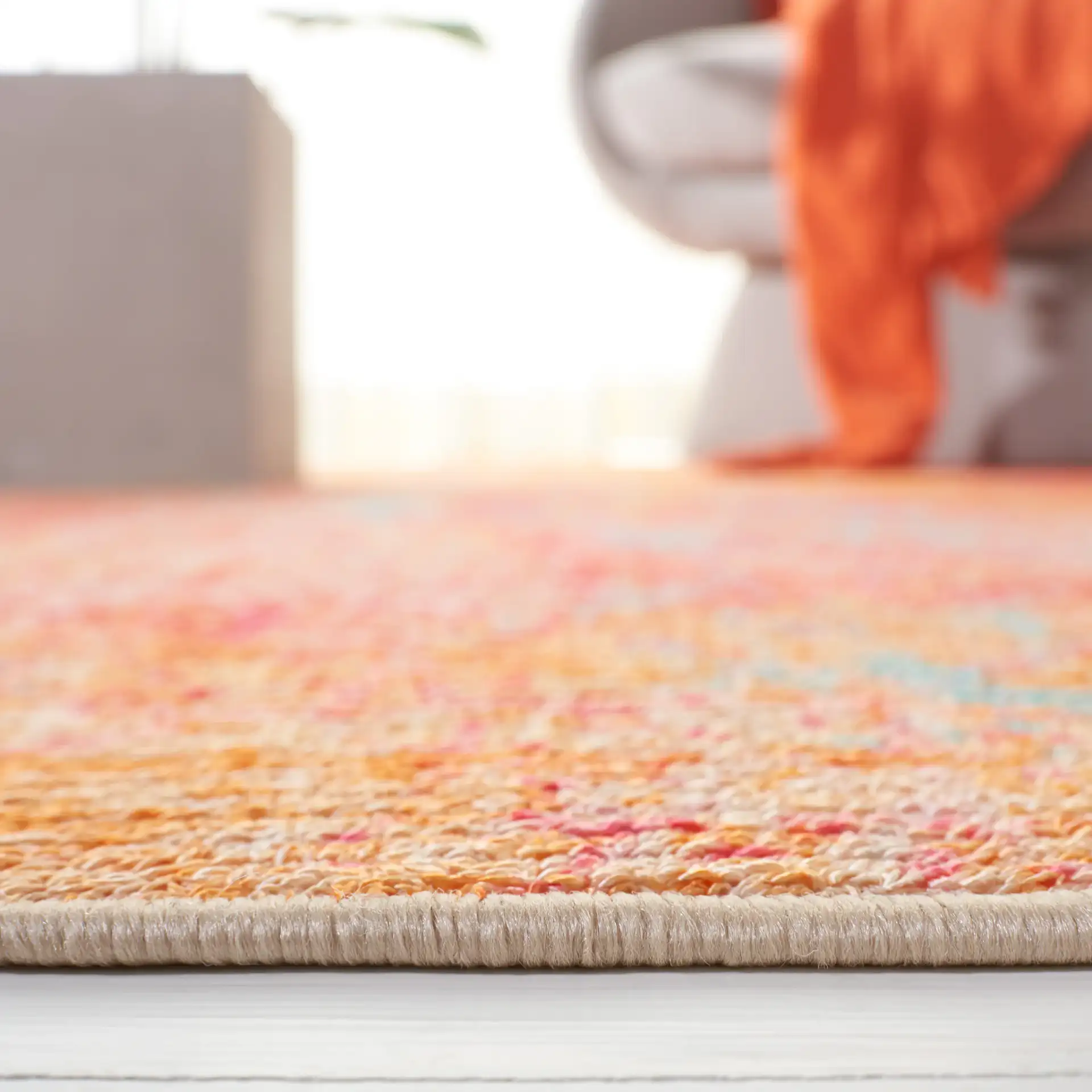 Sequoia Marble Abstract Washable Rug in Orange / Light Blue in a styled room