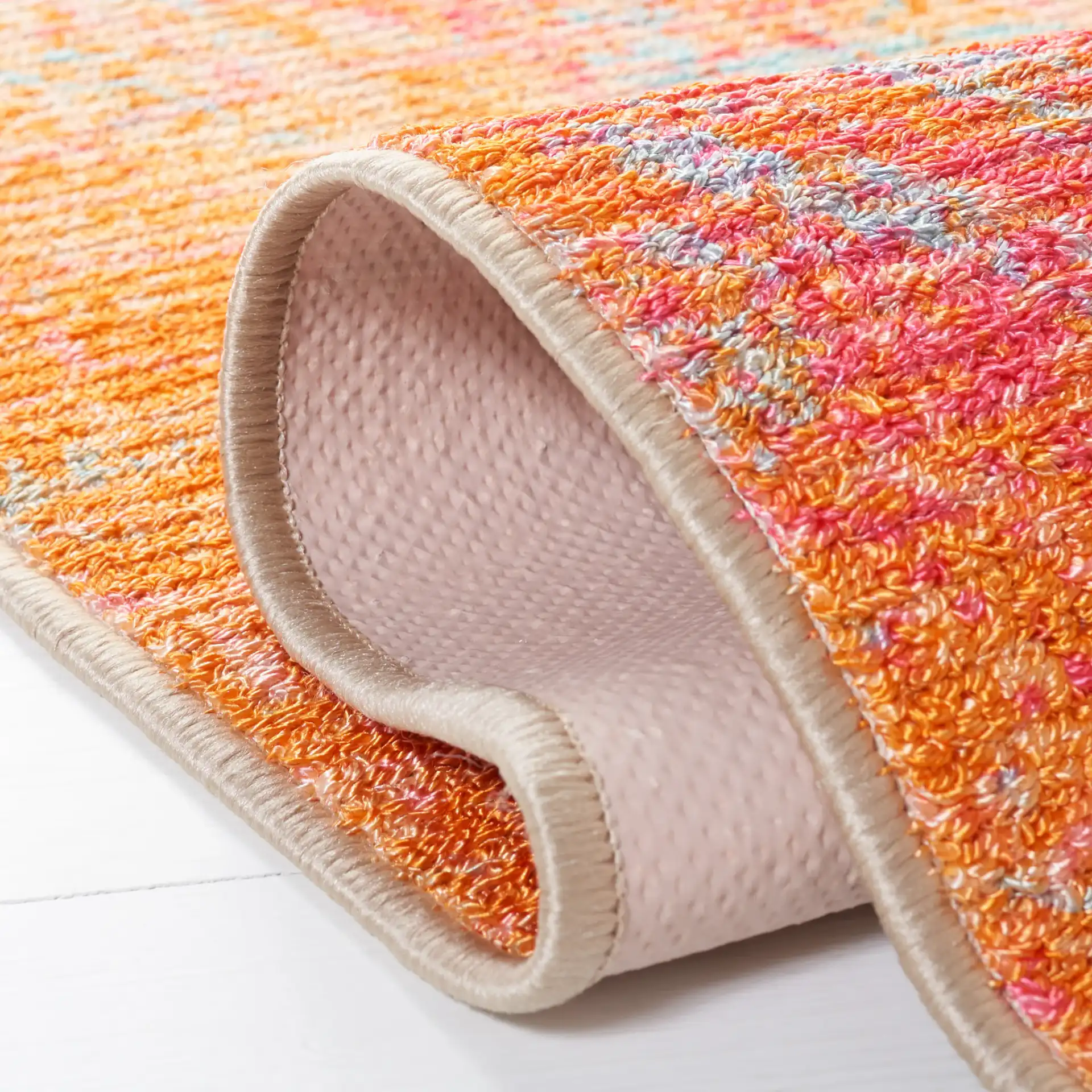 Sequoia Marble Abstract Washable Rug in Orange / Light Blue in a styled room