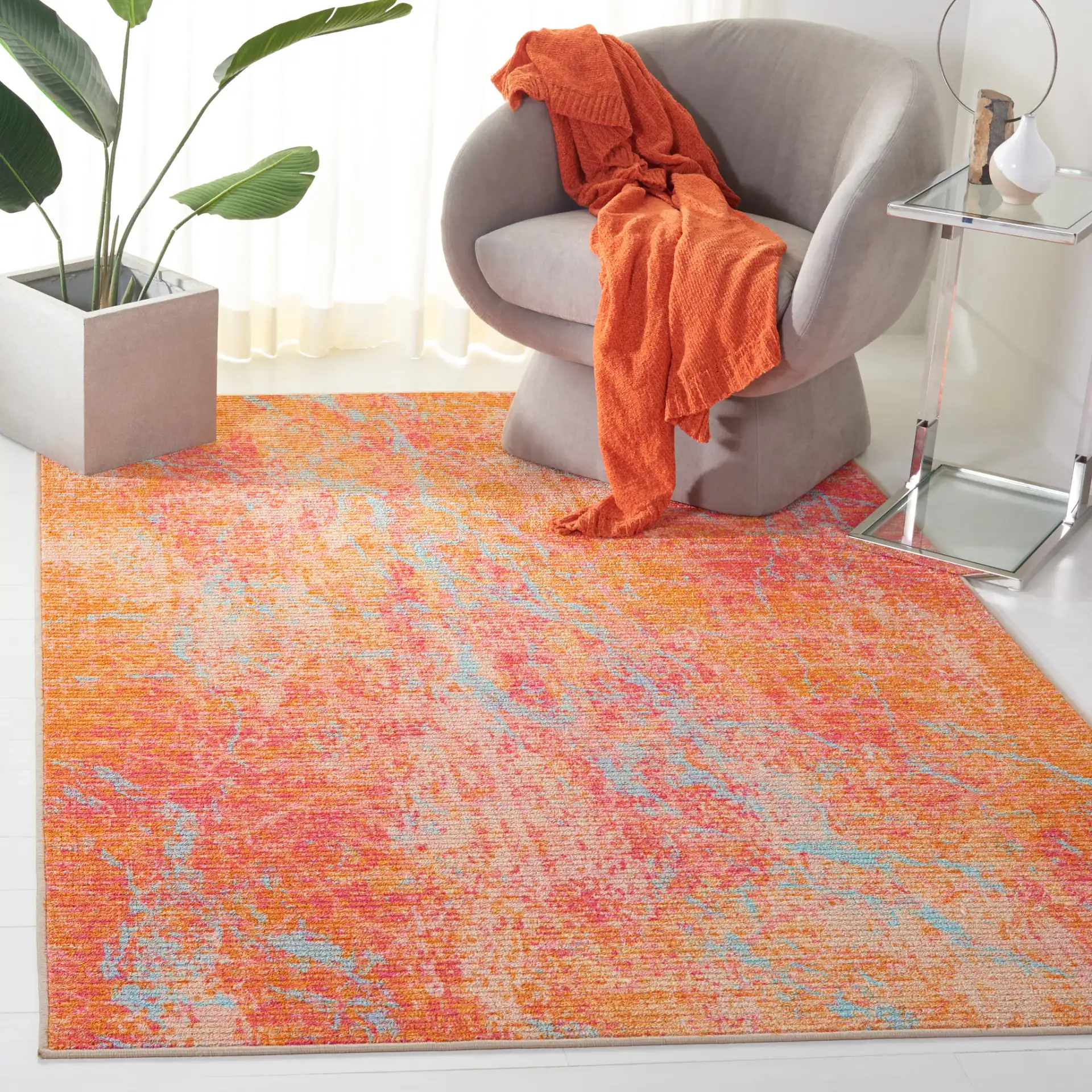 Sequoia Marble Abstract Washable Rug in Orange / Light Blue in a styled room