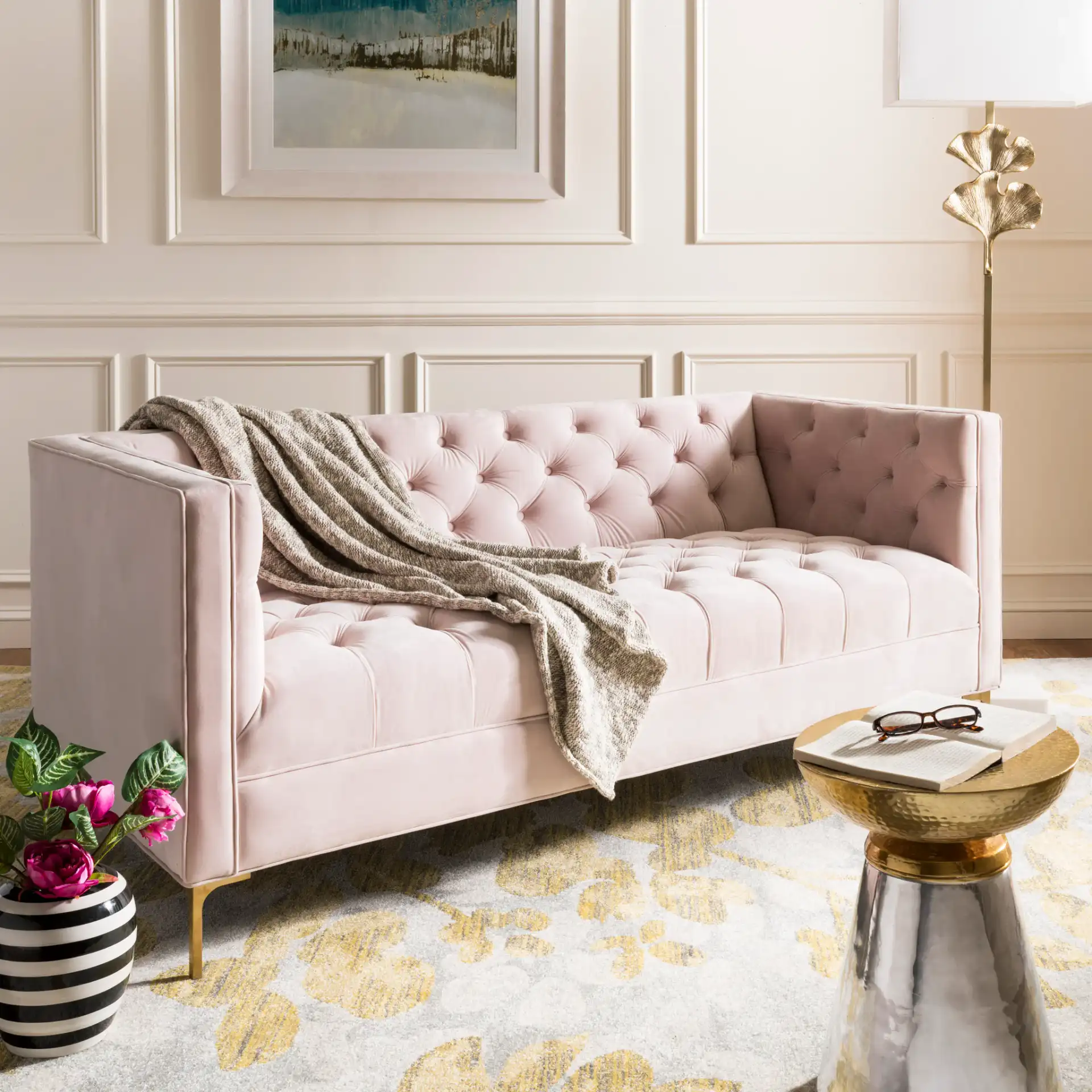 Vydia Tufted Sofa in Blush / Gold in a styled room