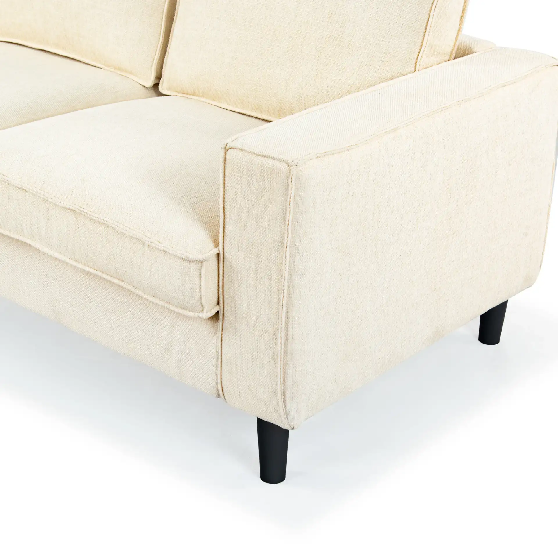 Kalyna Three-Seater Sofa in Cream in a styled room