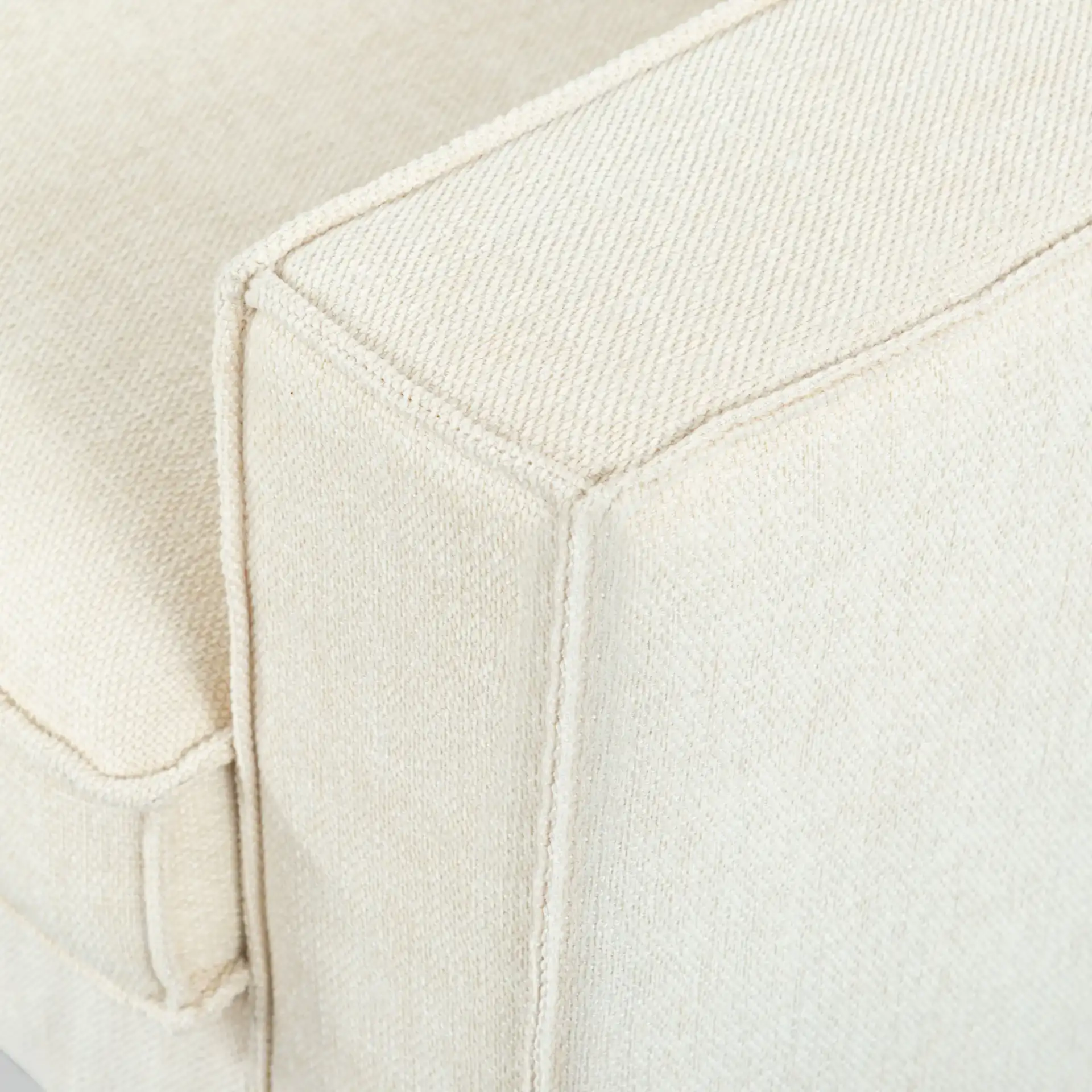 Kalyna Three-Seater Sofa in Cream in a styled room