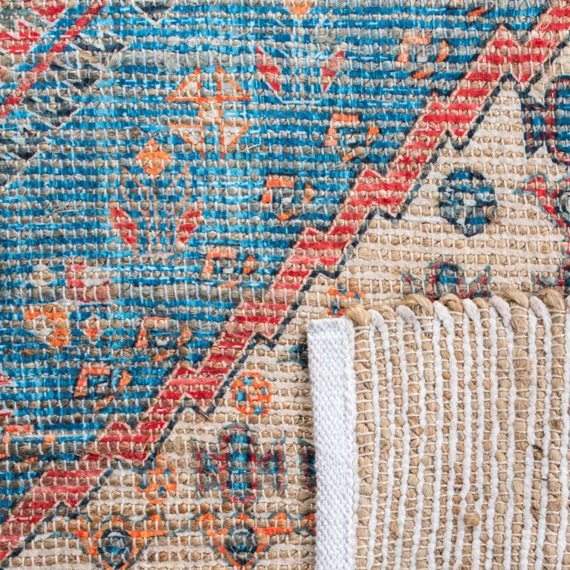 Saffron Tribal Triple Medallion Hand-Loomed Rug in Navy / Red in a styled room