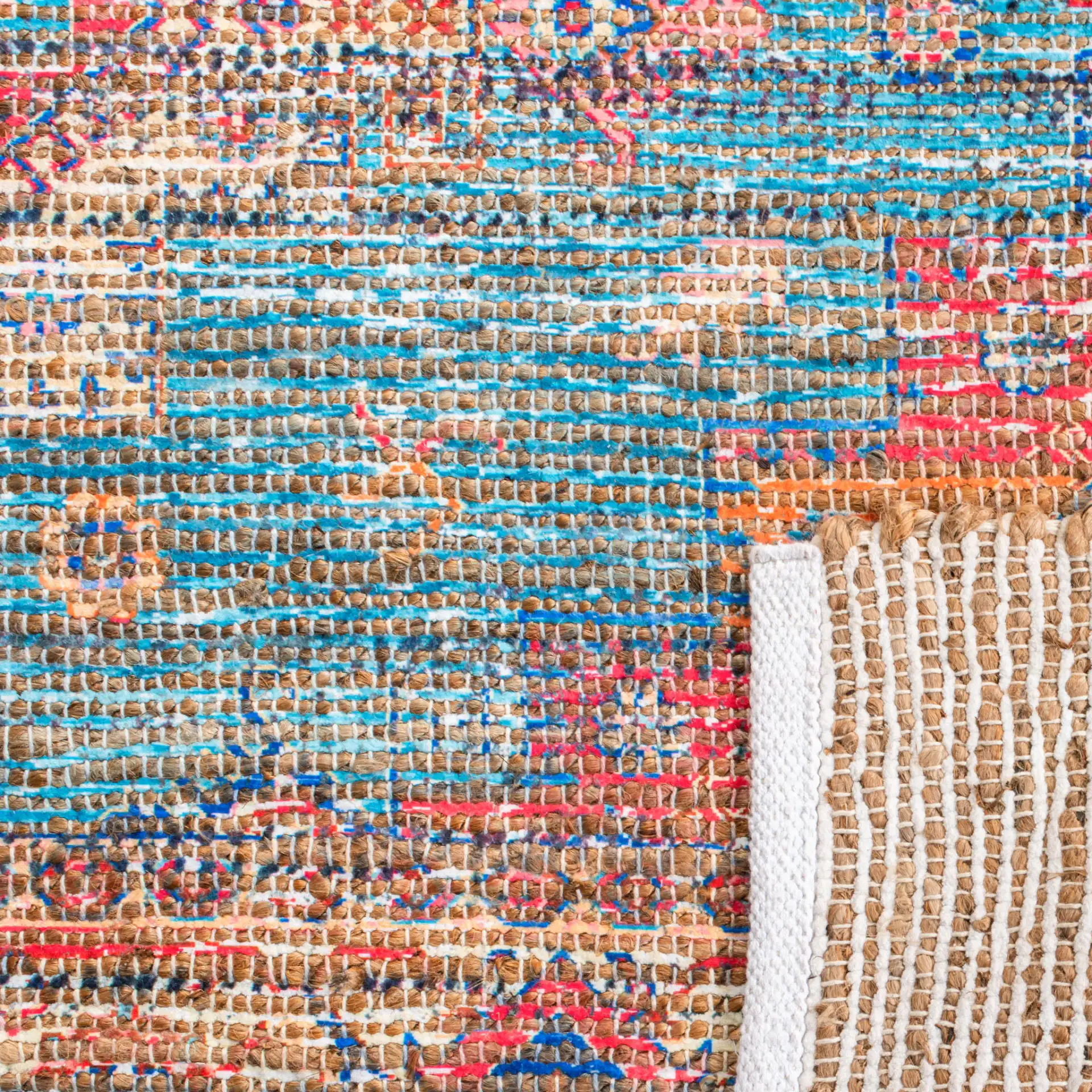 Saffron Abstract Medallion Hand-Loomed Rug in Rust / Blue in a styled room