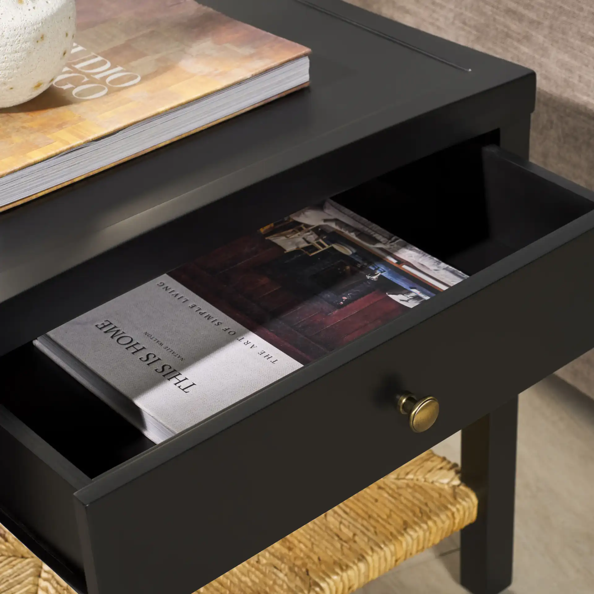 Berlynne Banana Stem Nightstand in Black / Natural in a styled room