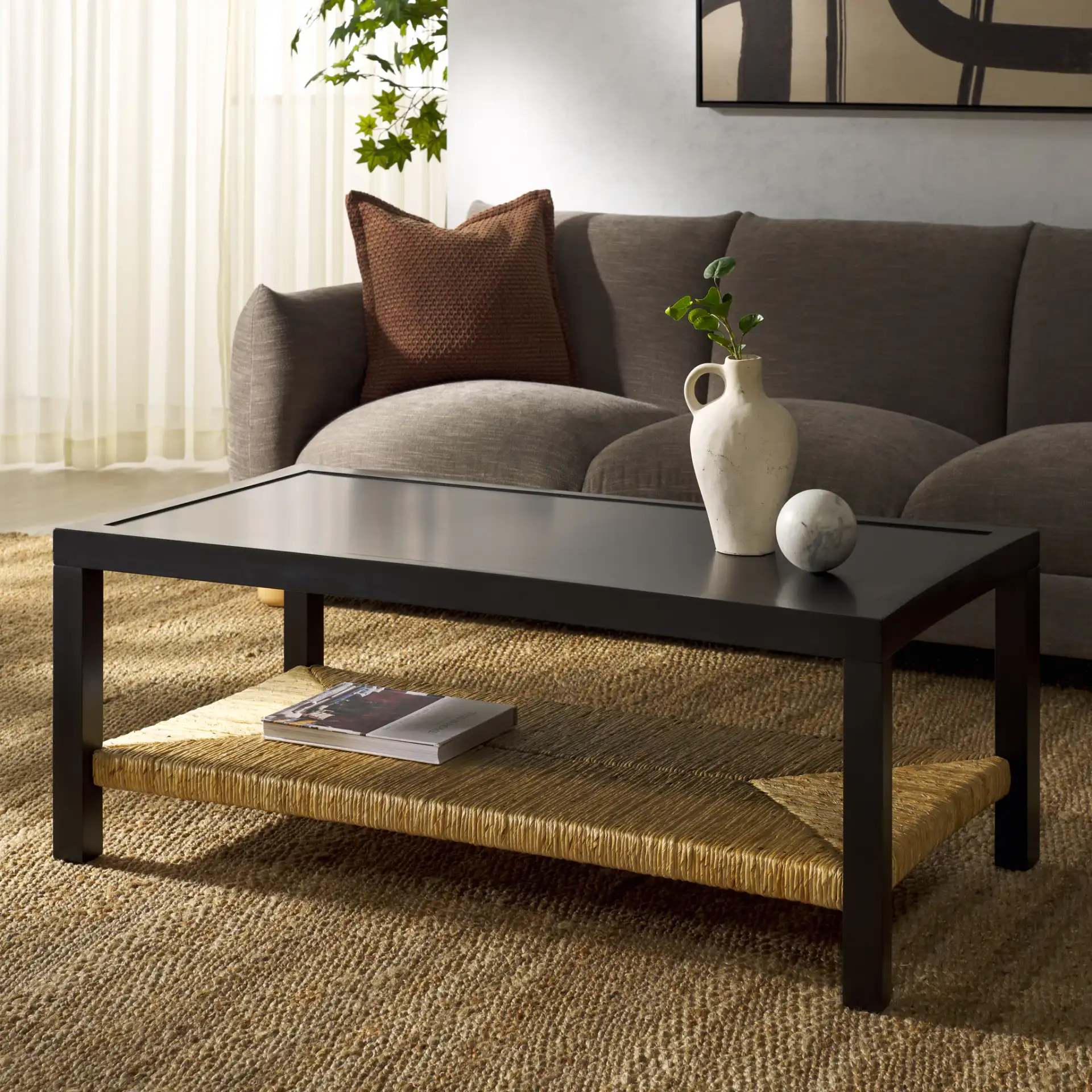 Berlynne Banana Coffee Table in Black / Natural in a styled room