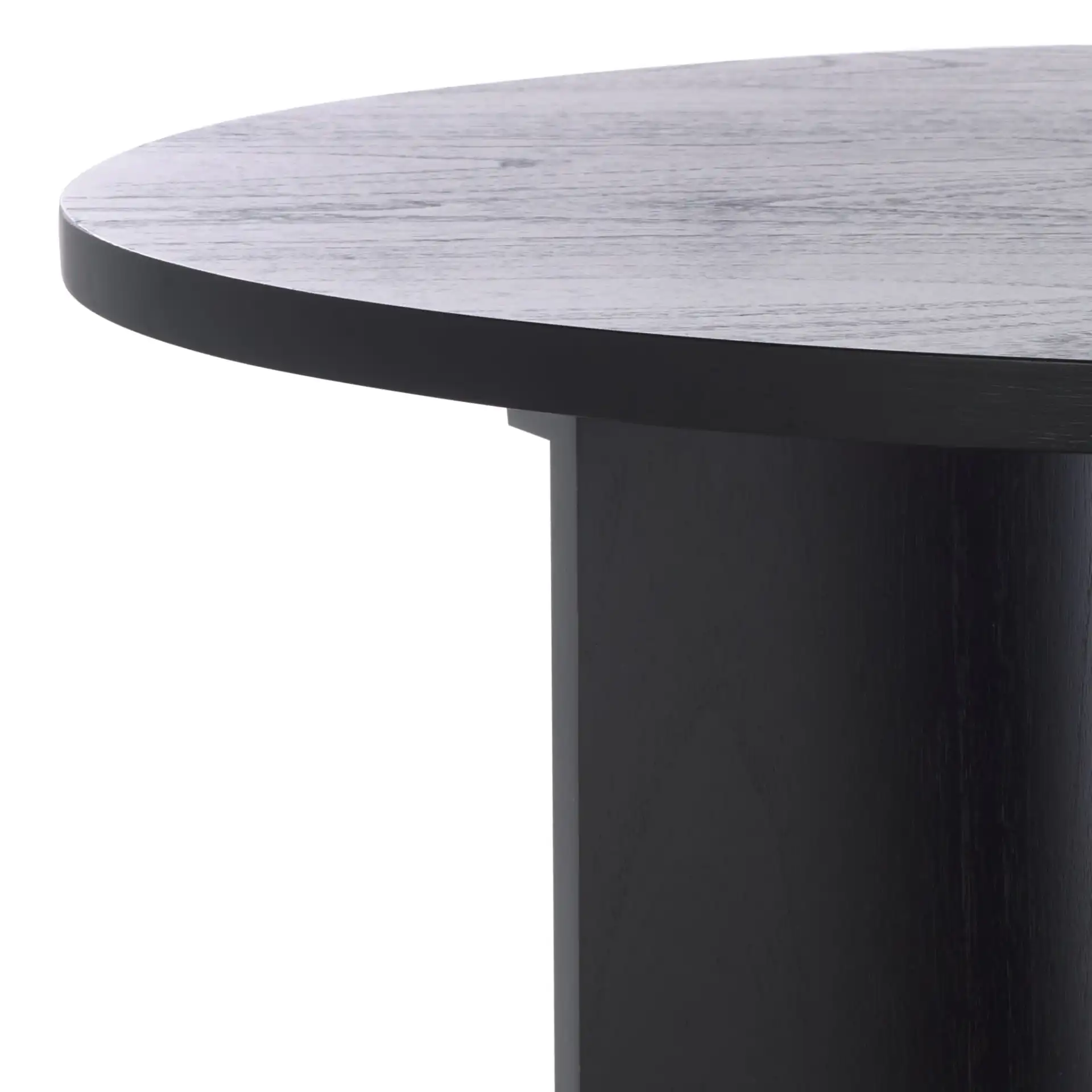 Audriella Round Wood Coffee Table in Black in a styled room