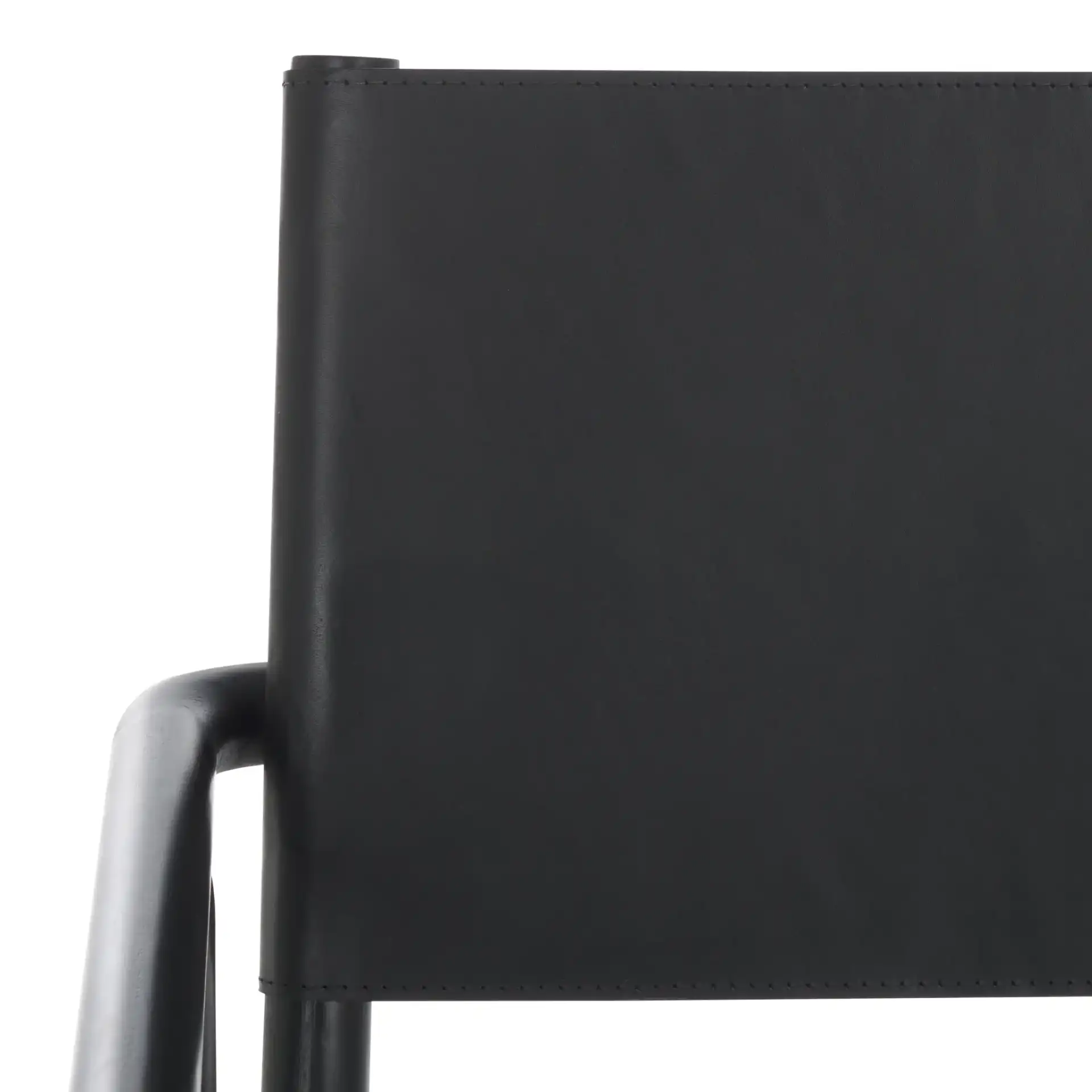 Hutson Leather Dining Chair in Tan / Natural in a styled room