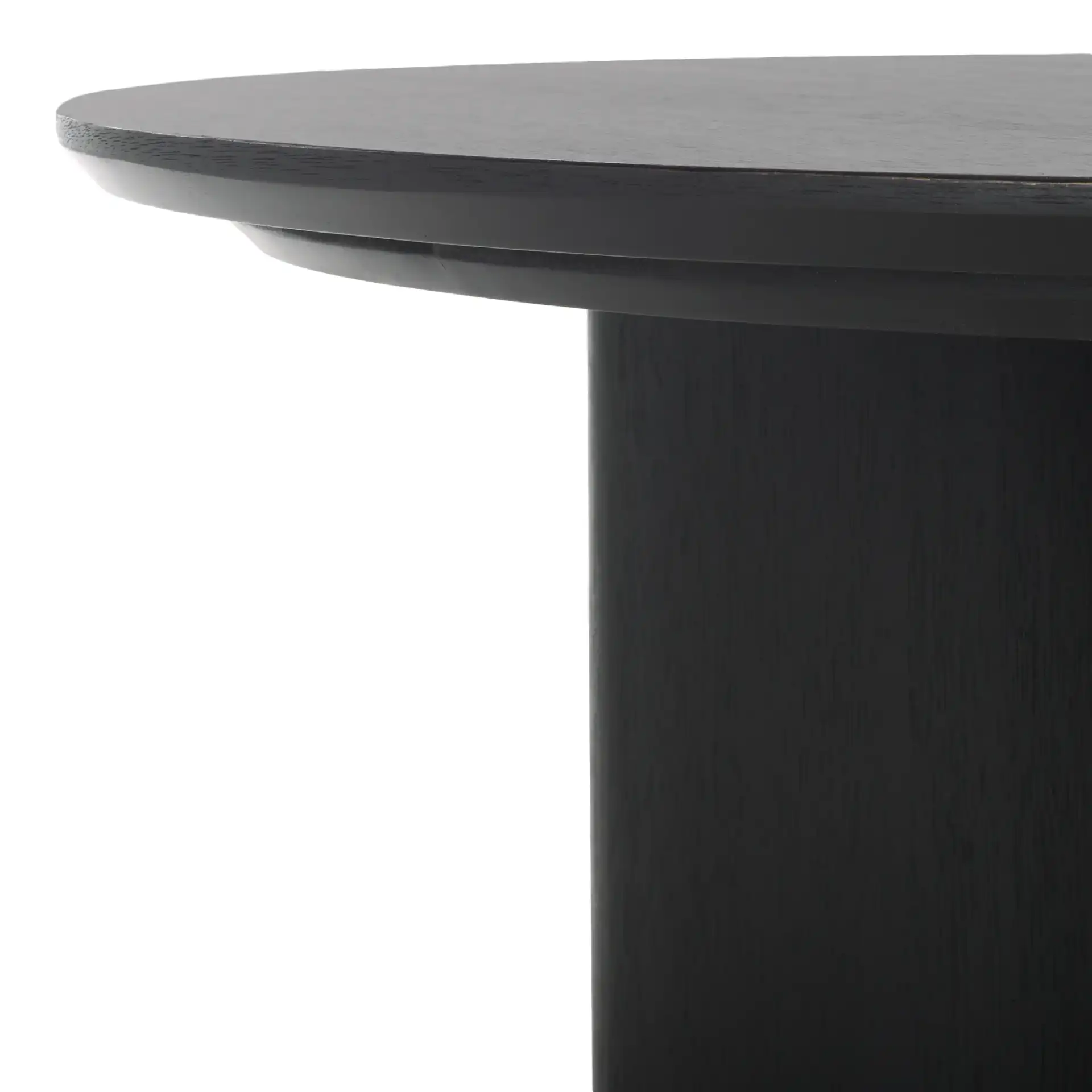 Barnard Round Wood Coffee Table in Black in a styled room