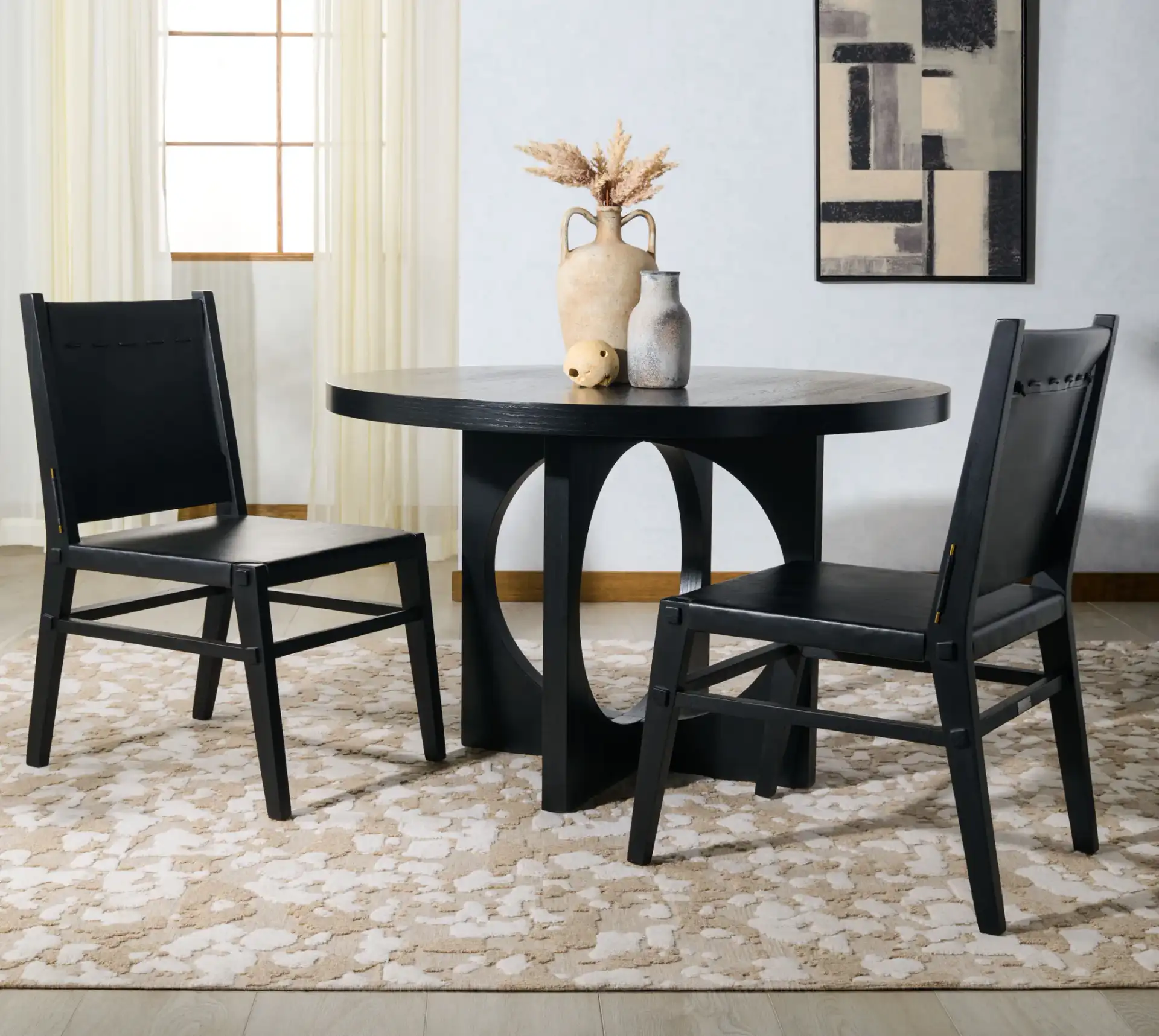 Catriella Leather Dining Chair (Set of 2) in Tan / Natural in a styled room