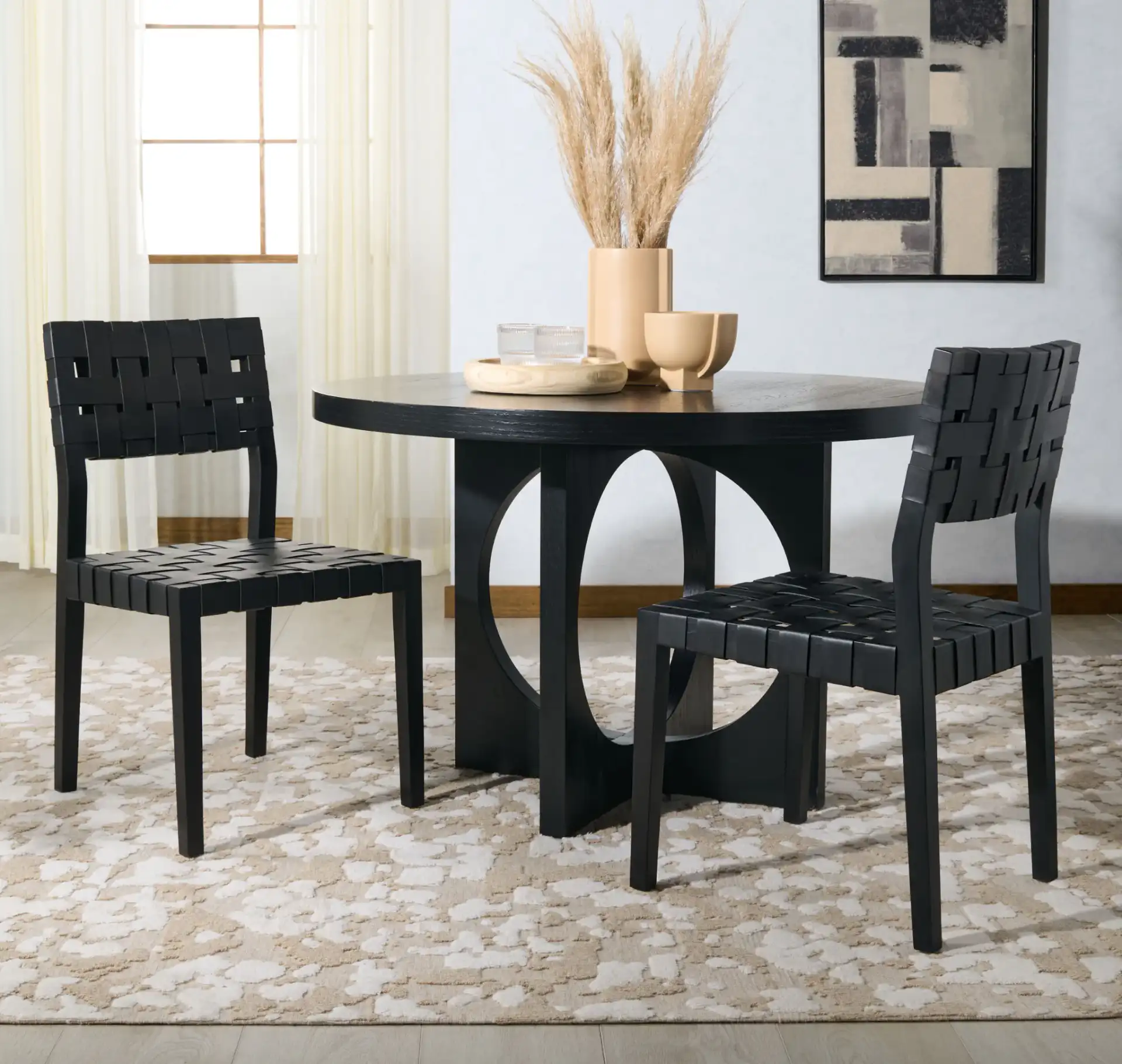 Bette Woven Leather Dining Chair (Set of 2) in Black in a styled room