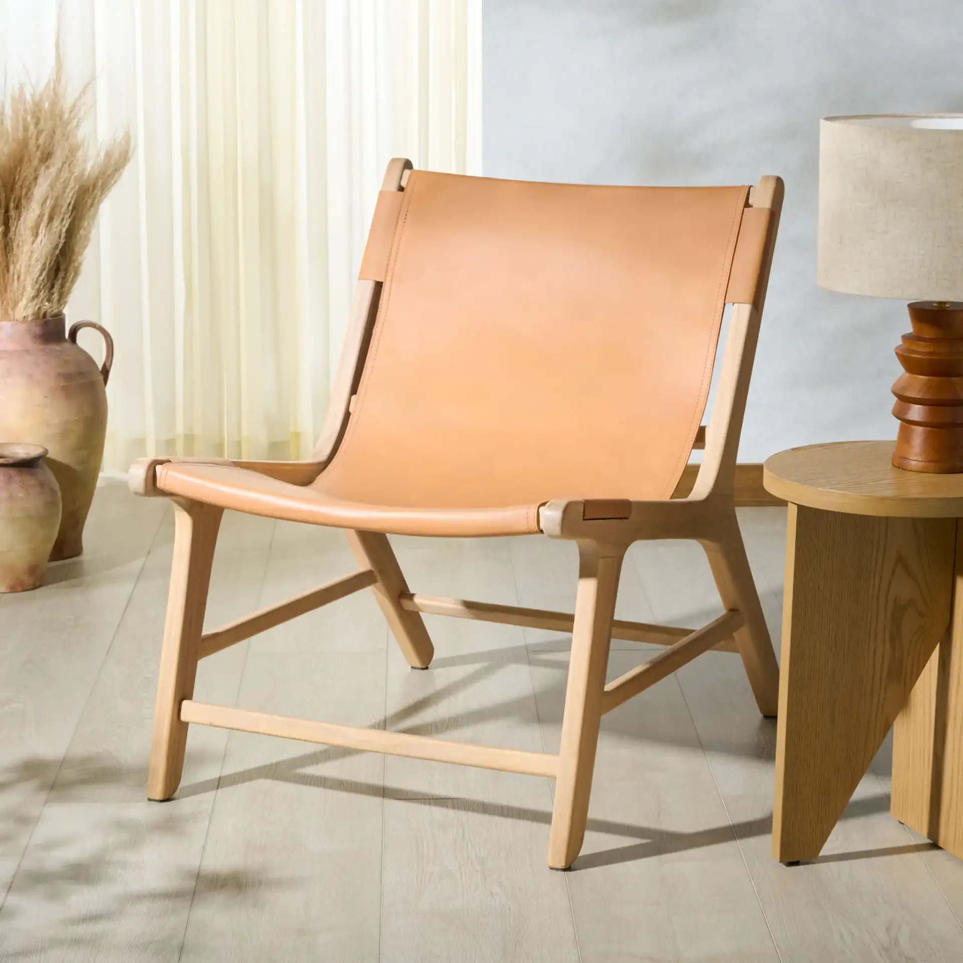 Alanarose Leather Accent Chair in Tan / Natural in a styled room