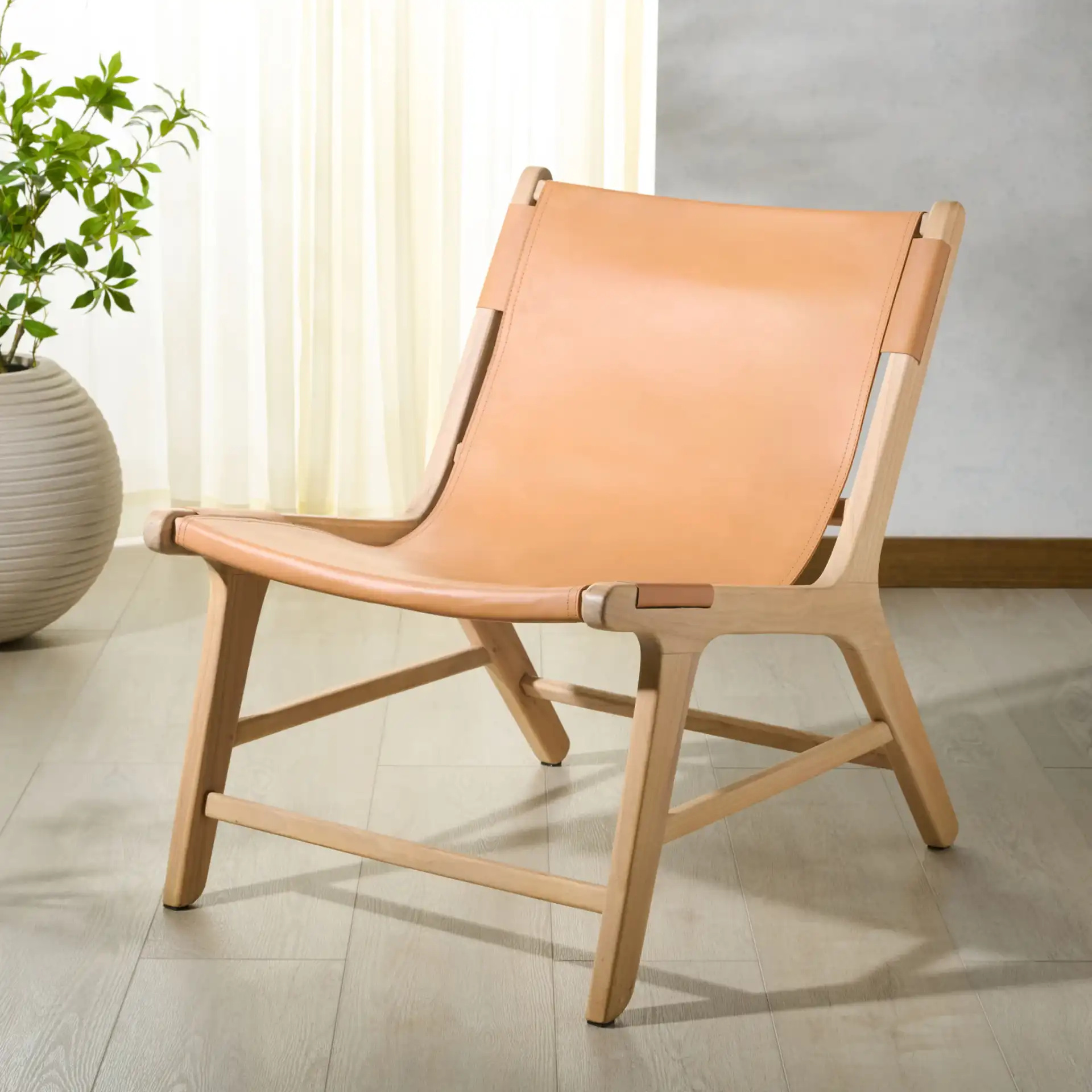 Alanarose Leather Accent Chair in Tan / Natural in a styled room