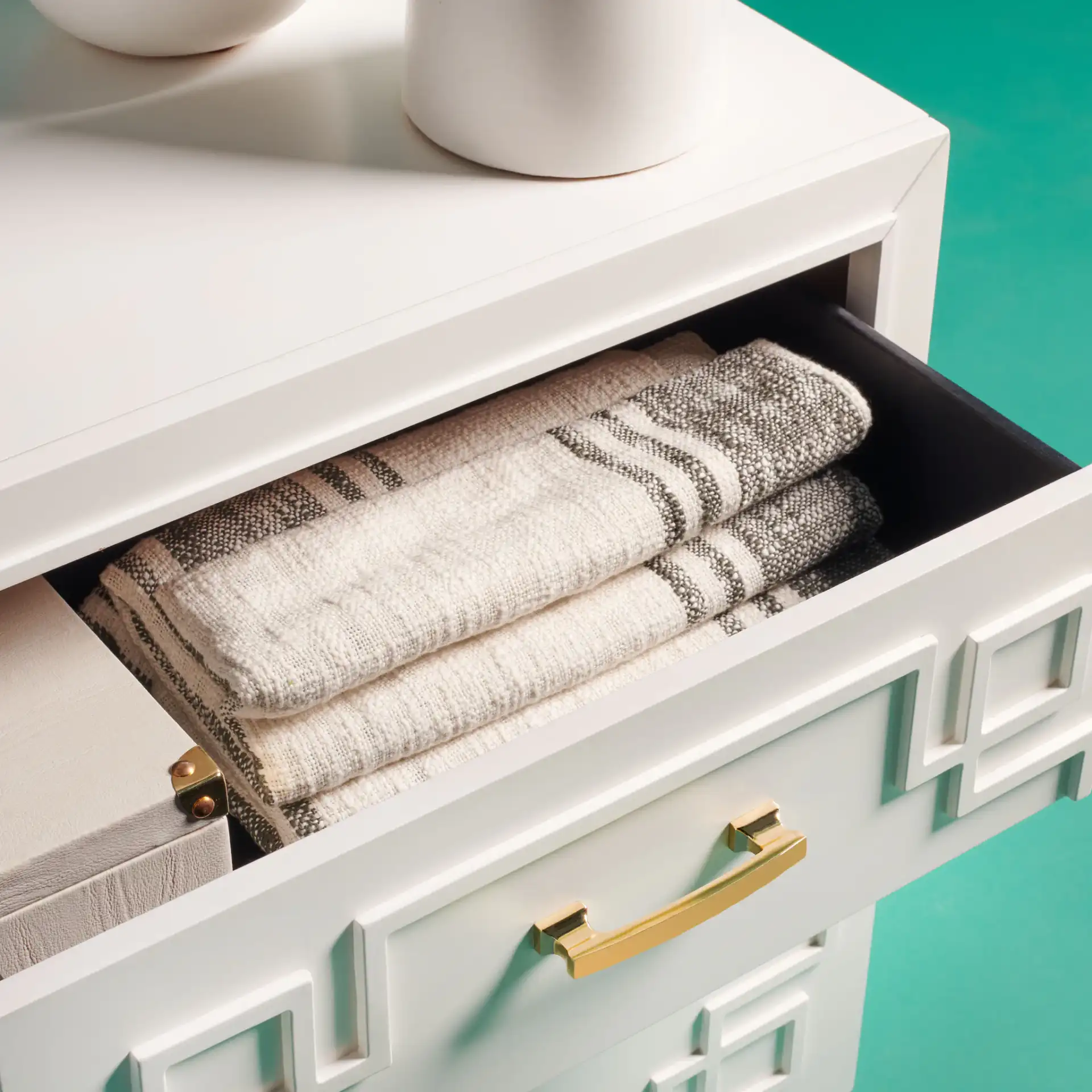Raina Six-Drawer Dresser in Gray / Silver in a styled room