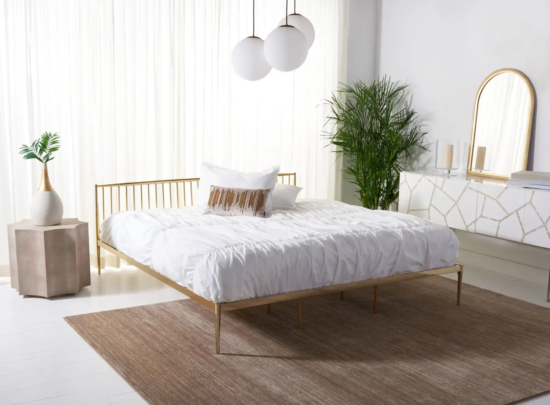 Eliza Metal Bed in Gold in a styled room