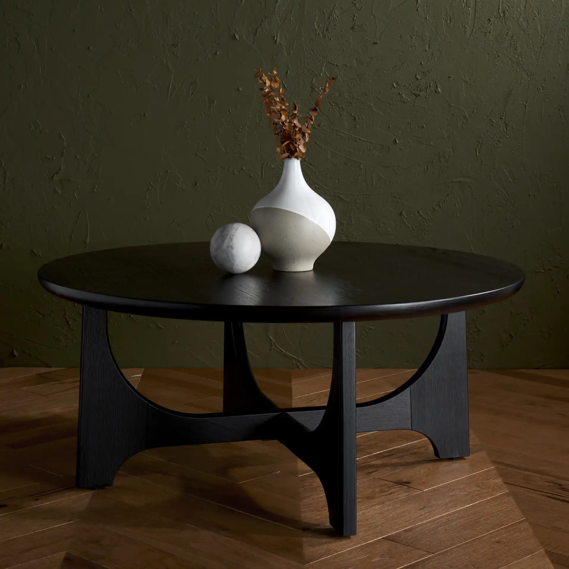 Sasha Wood Coffee Table in Black in a styled room