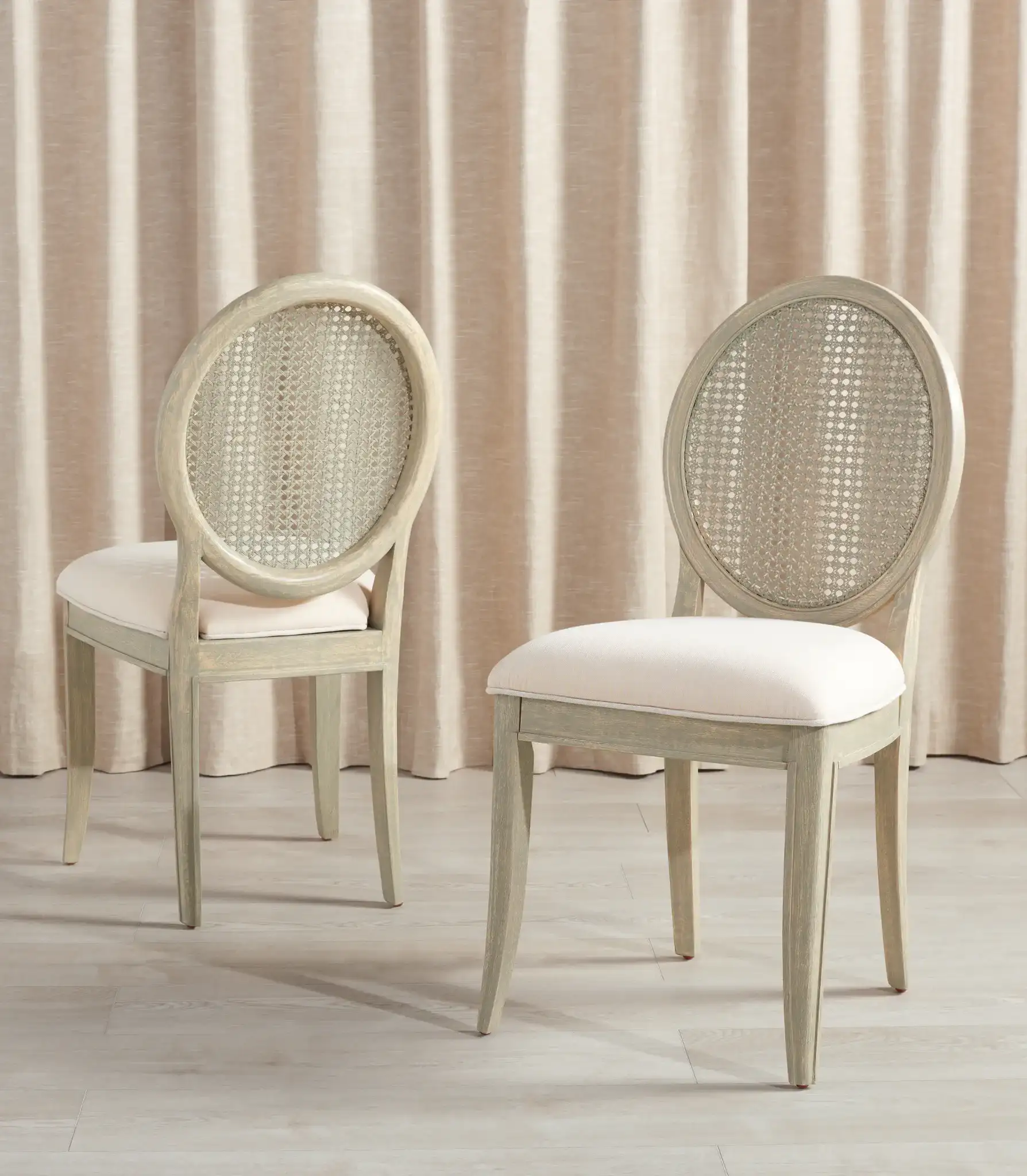 Karlee Rattan Back Dining Chair (Set of 2) in Rustic Gray / Beige in a styled room
