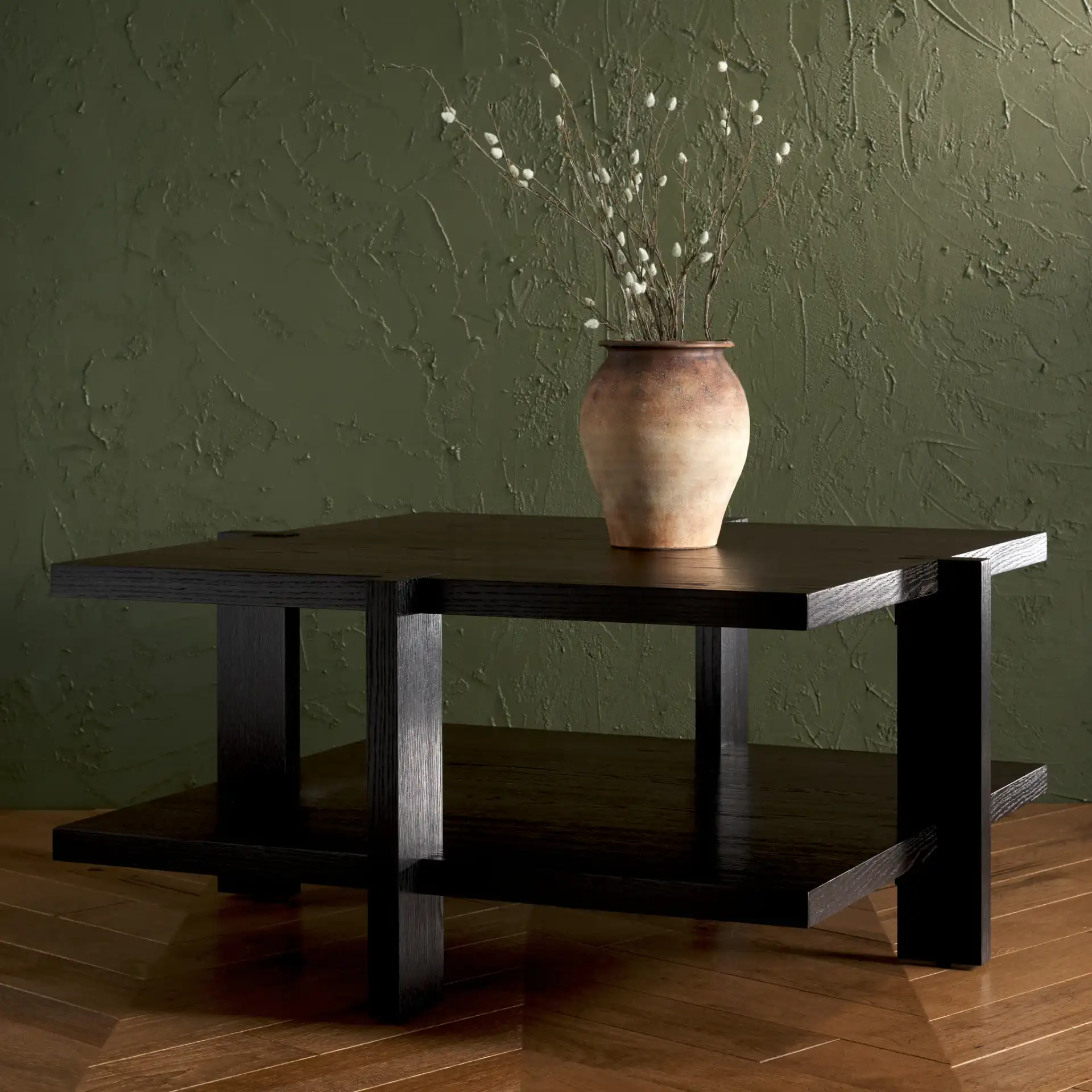 Quigley Square Coffee Table in Black in a styled room