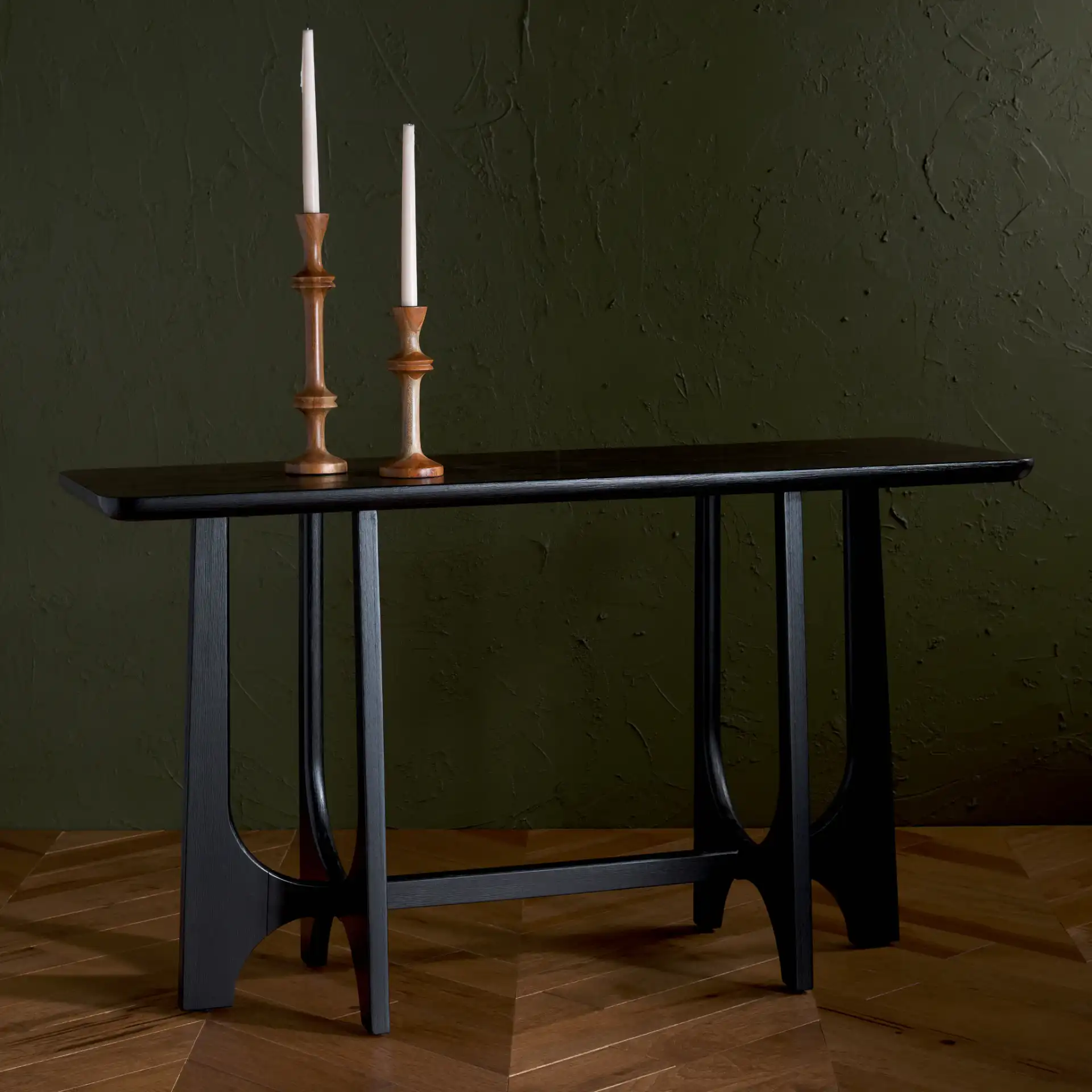 Sasha Wood Console Table in Black in a styled room