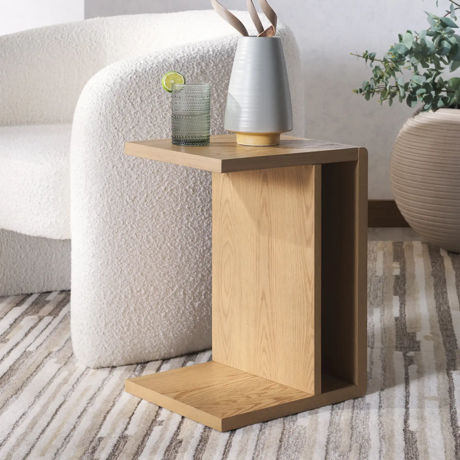 Kassia Wood "C" Table in Medium Oak in a styled room