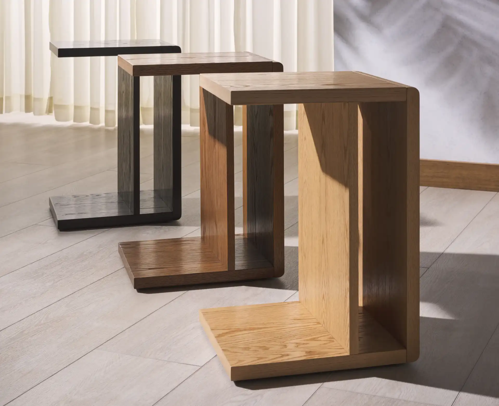Kassia Wood "C" Table in Medium Oak, detail view