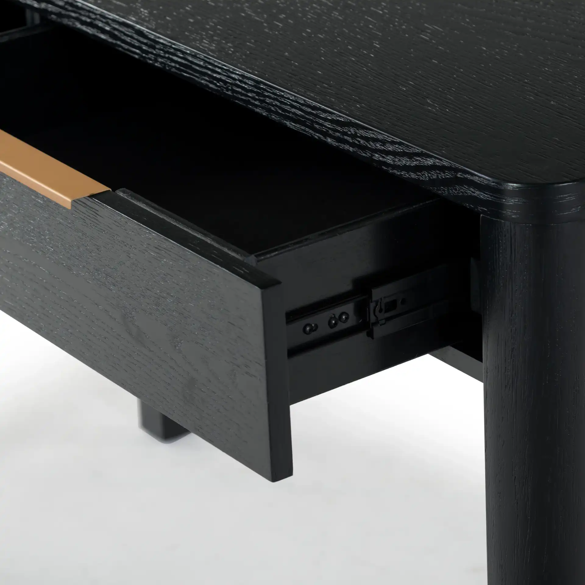 Gabrietta Two-Drawer Wood Desk in Black / Gold in a styled room