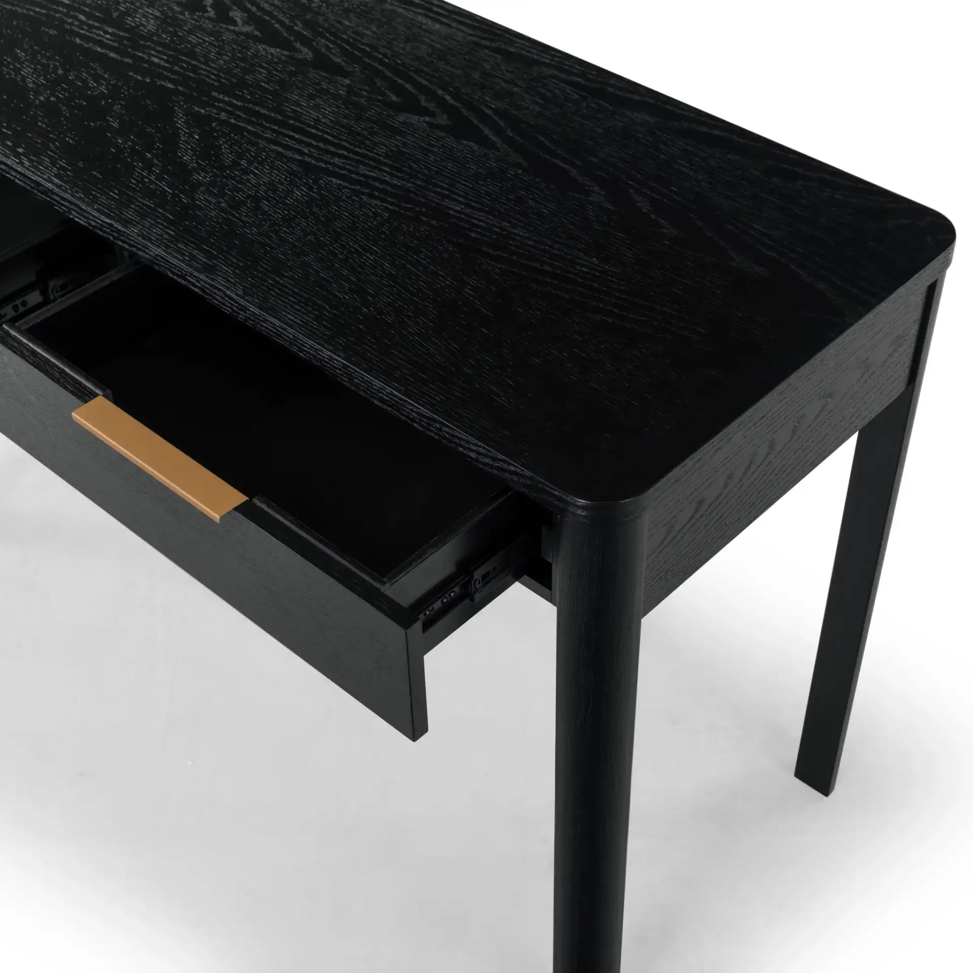 Gabrietta Two-Drawer Wood Desk in Black / Gold in a styled room