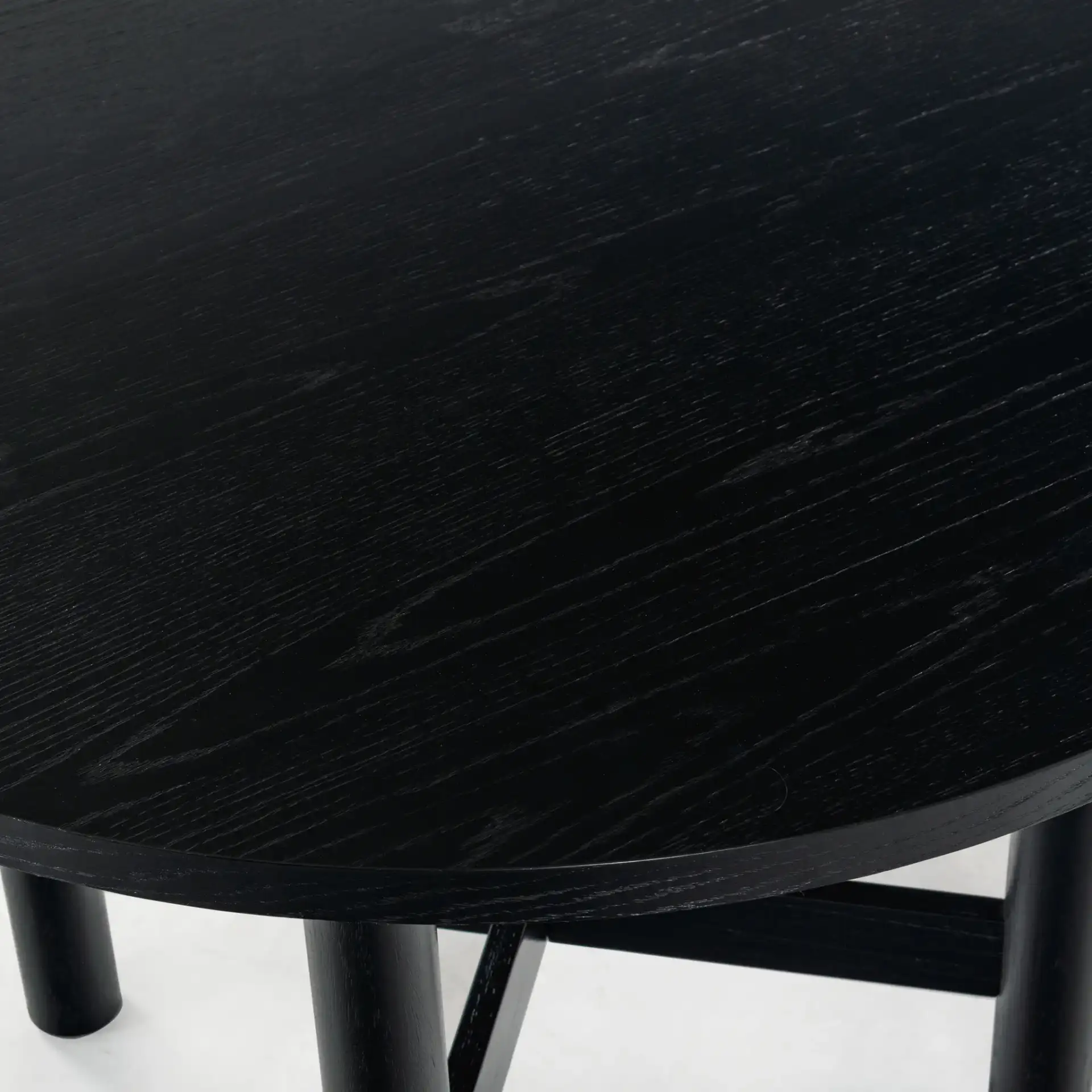 Ruthanne Wood 47-Inch Dining Table in Black in a styled room