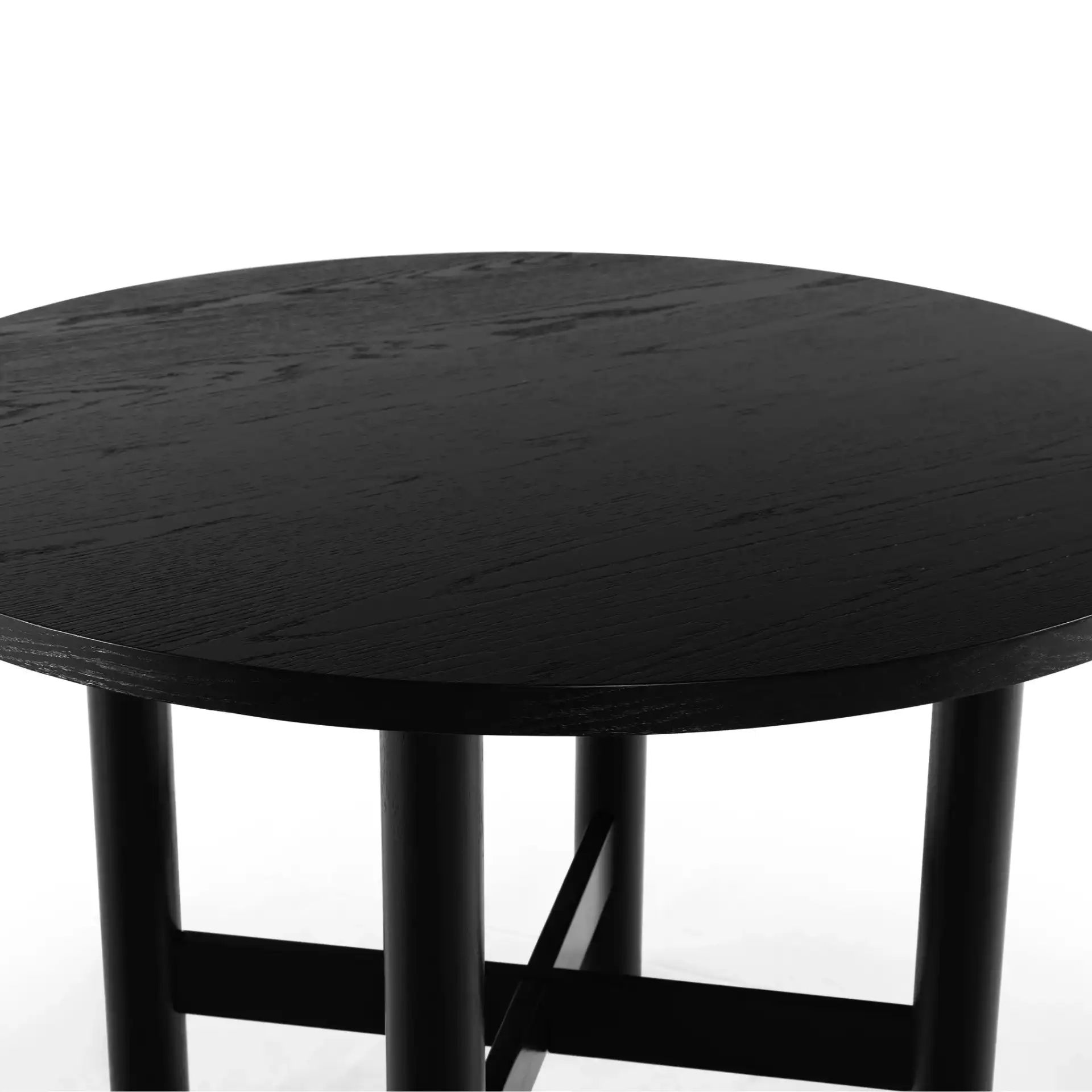 Ruthanne Wood 47-Inch Dining Table in Black in a styled room