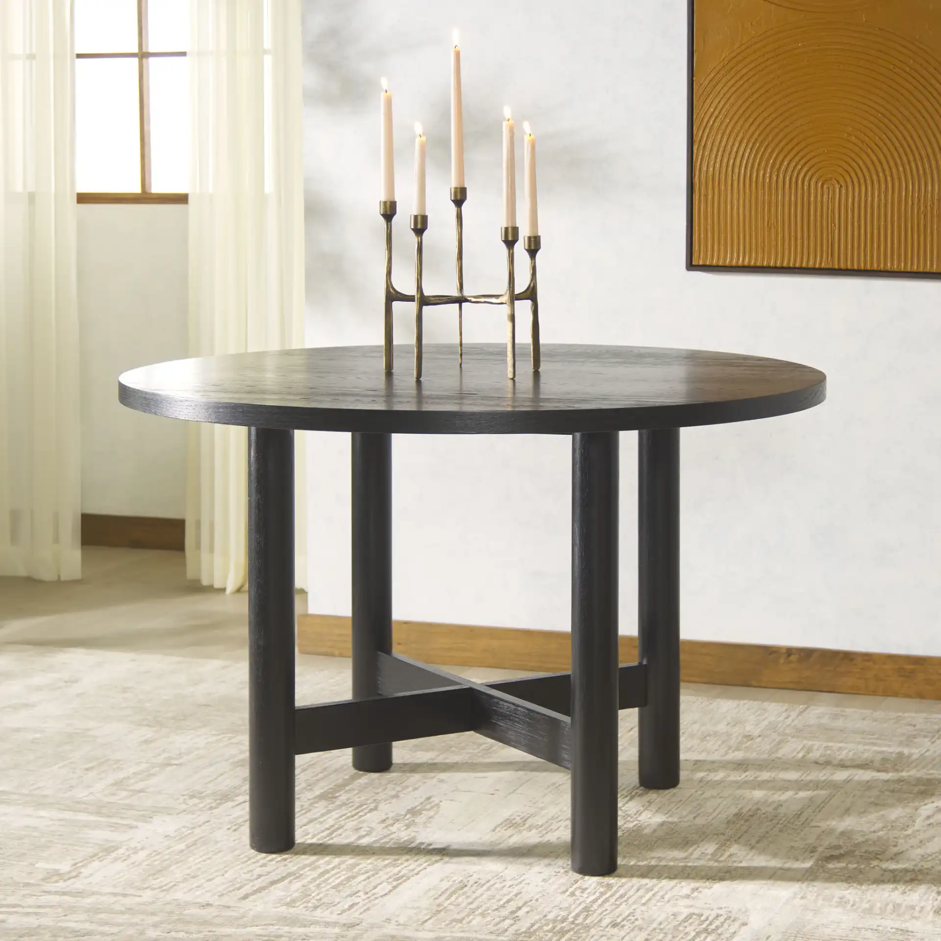 Ruthanne Wood 47-Inch Dining Table in Black in a styled room