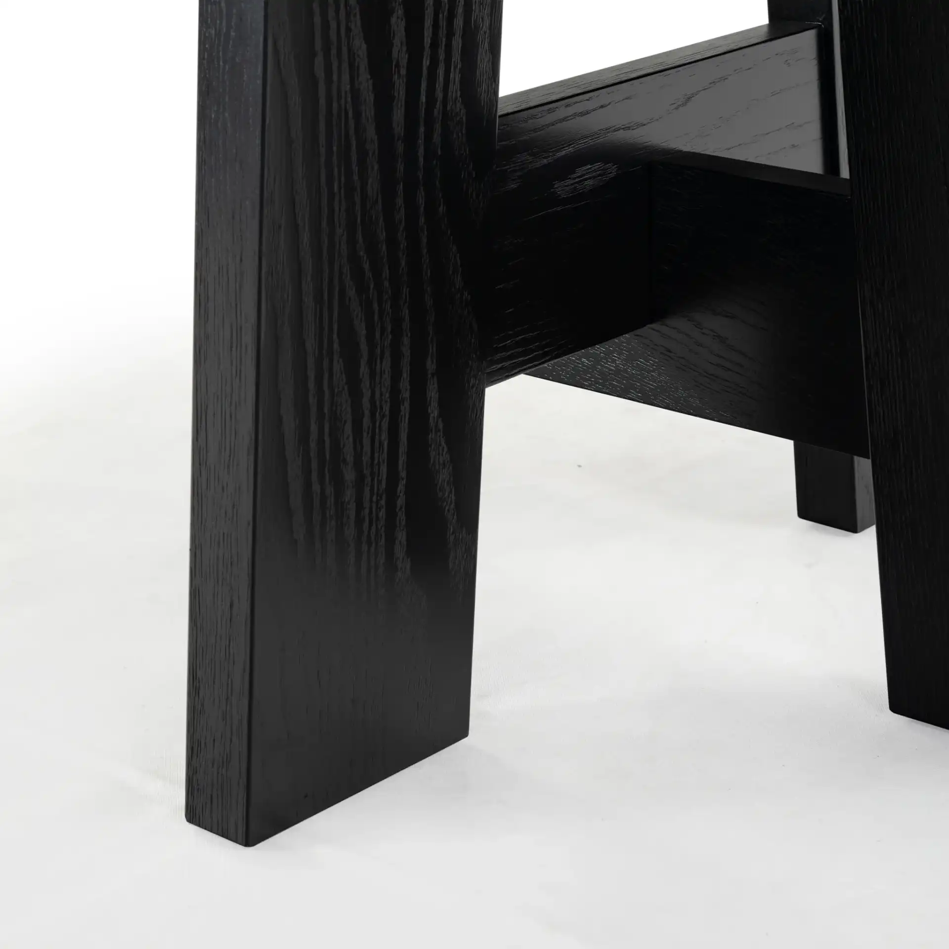 Beverley Wood 47" Dining Table in Black in a styled room