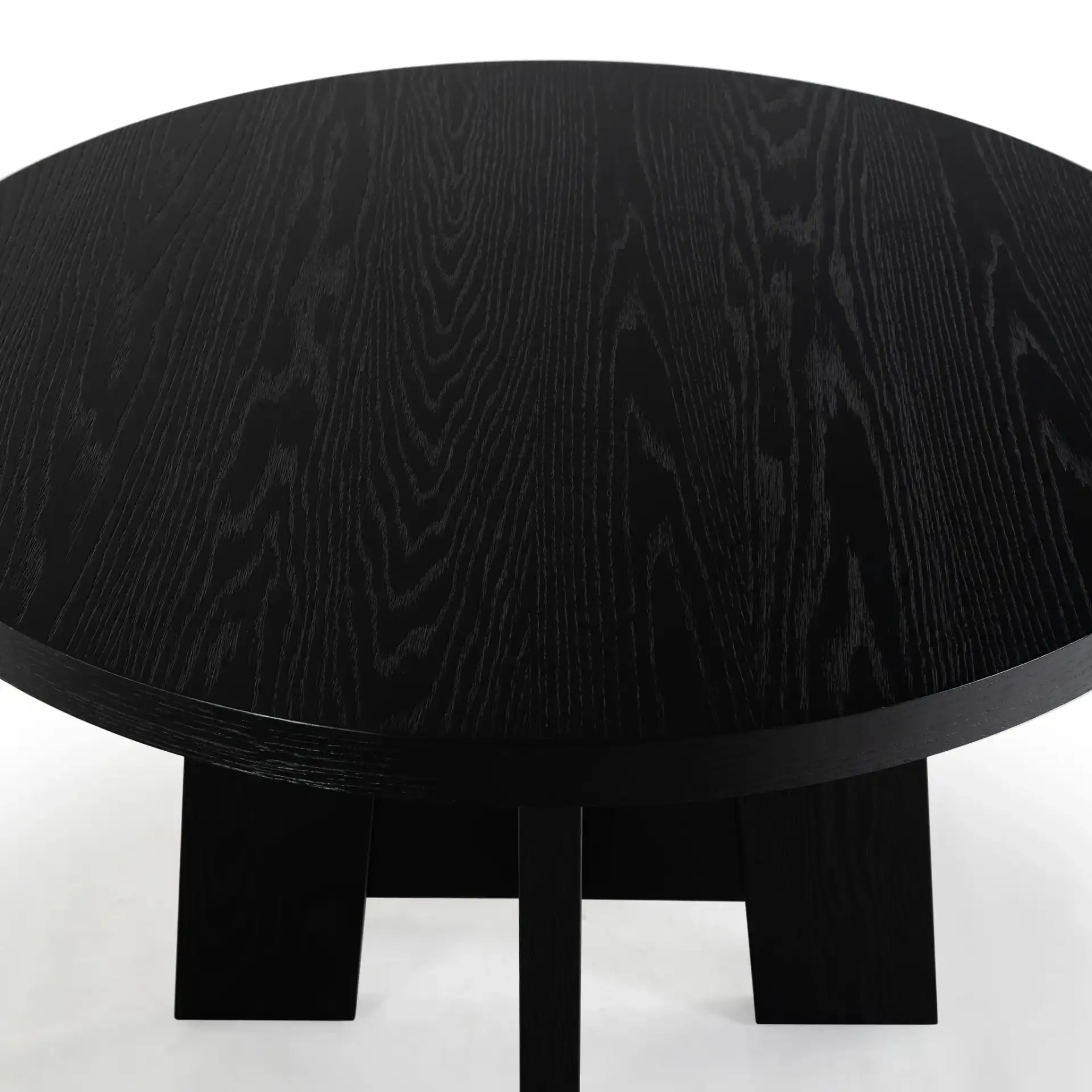 Beverley Wood 47" Dining Table in Black in a styled room