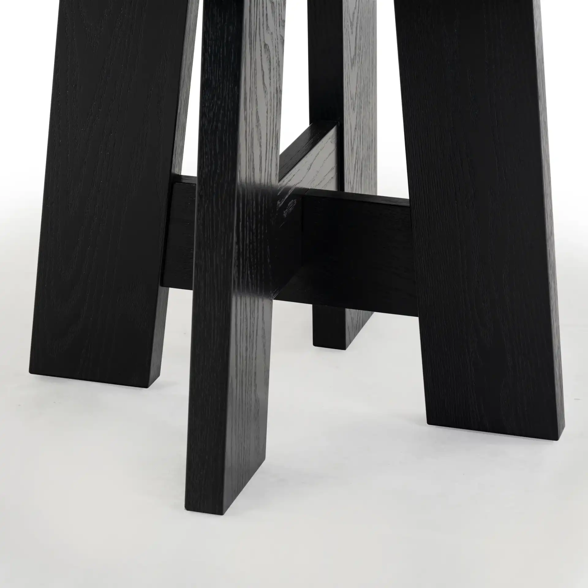 Beverley Wood 47" Dining Table in Black in a styled room
