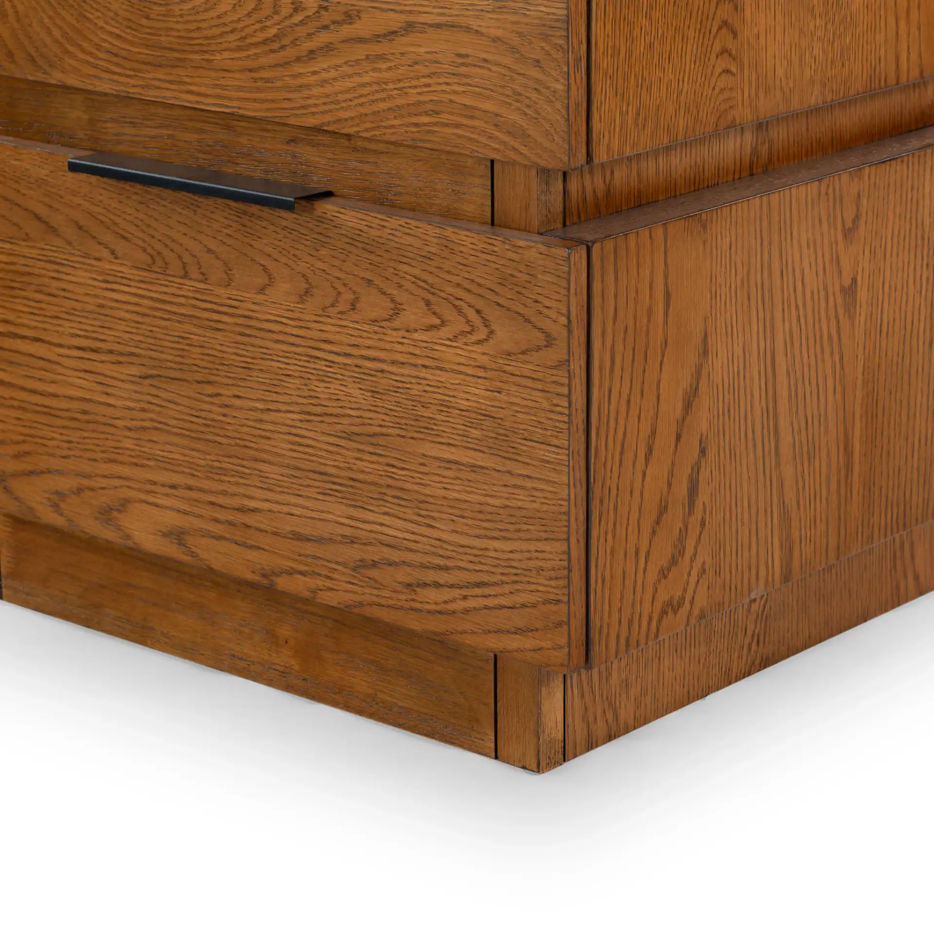 Titus Two-Drawer Nightstand in Medium Oak in a styled room