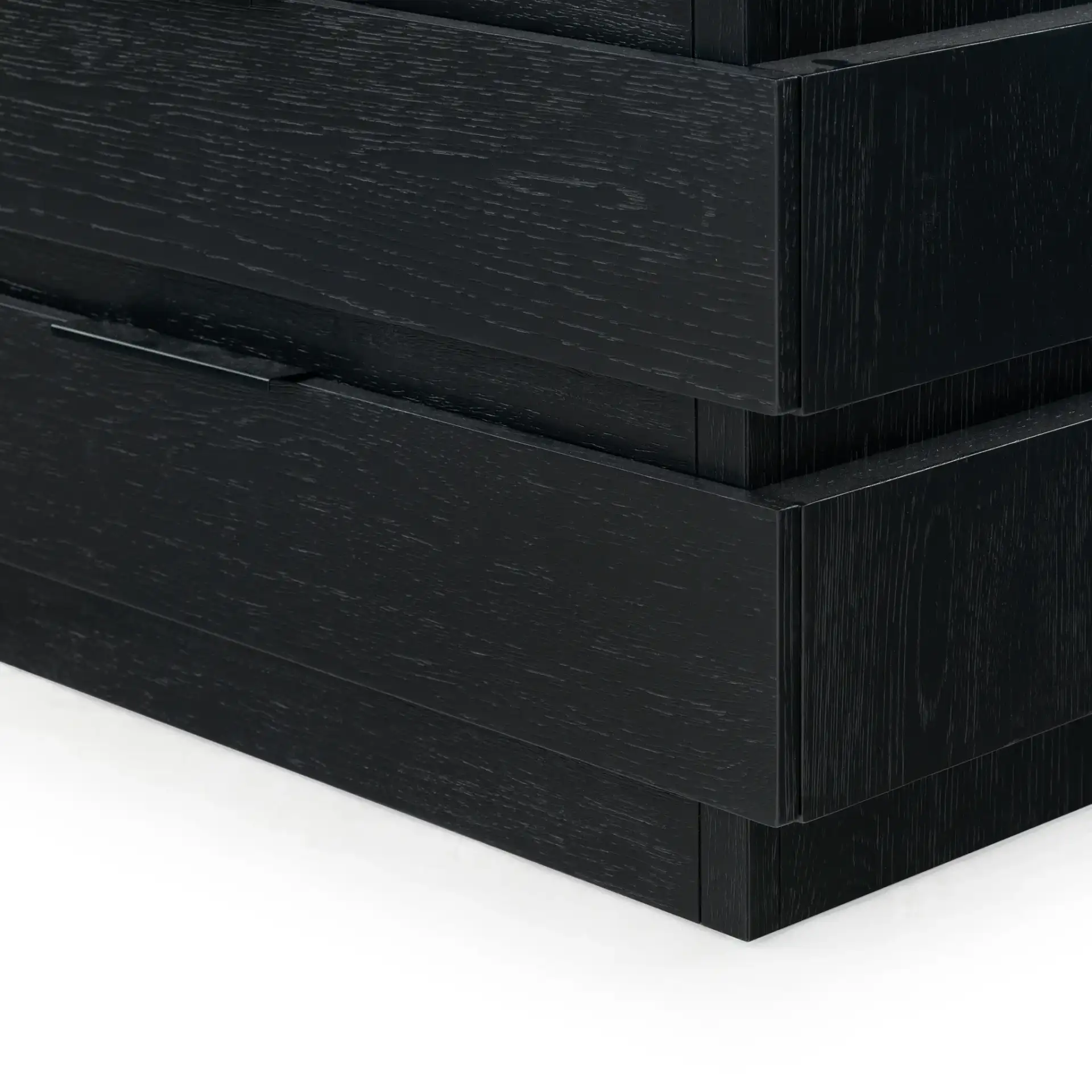 Titus Three-Drawer Stacked Chest in Black in a styled room