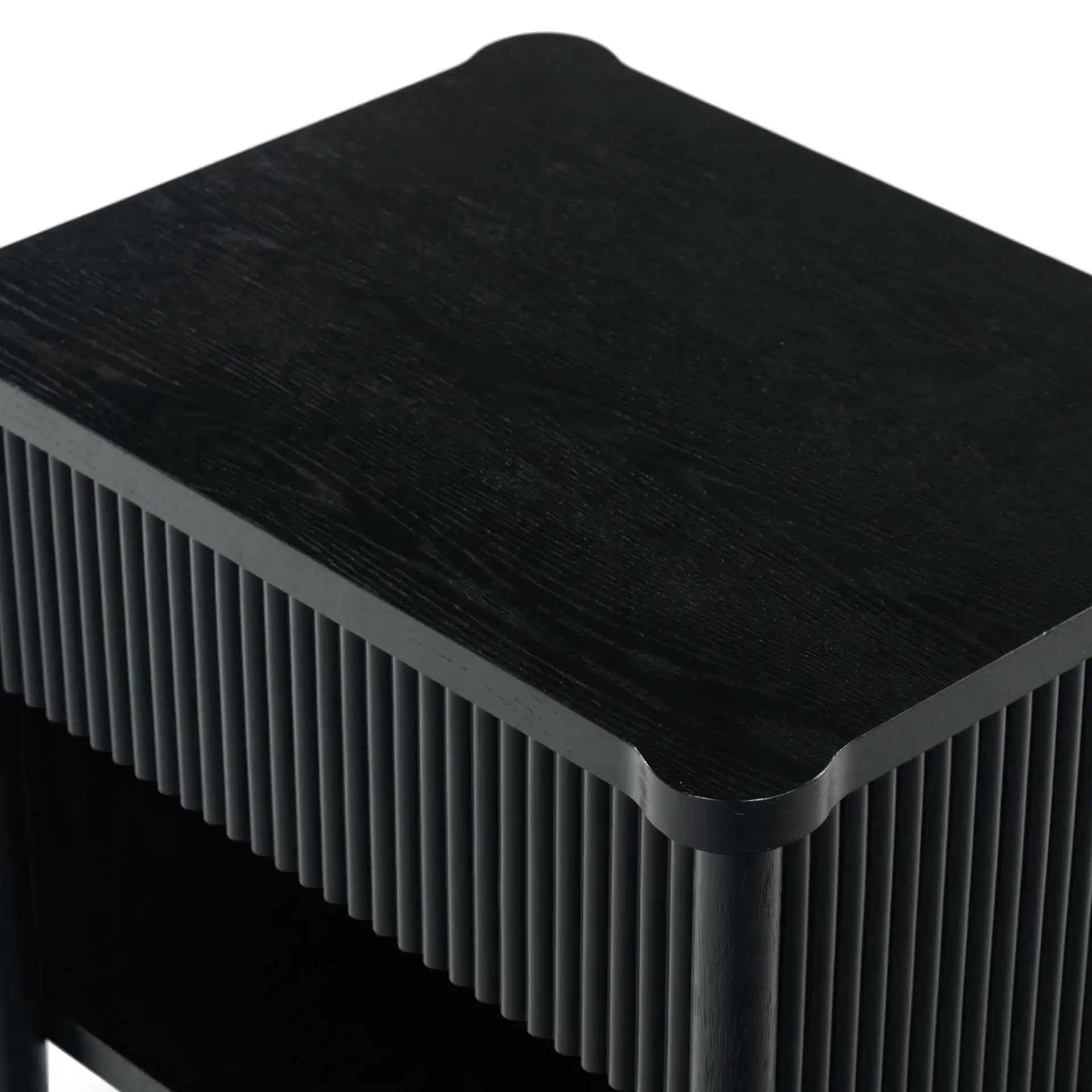 Shelbie One-Drawer Nightstand in Black in a styled room